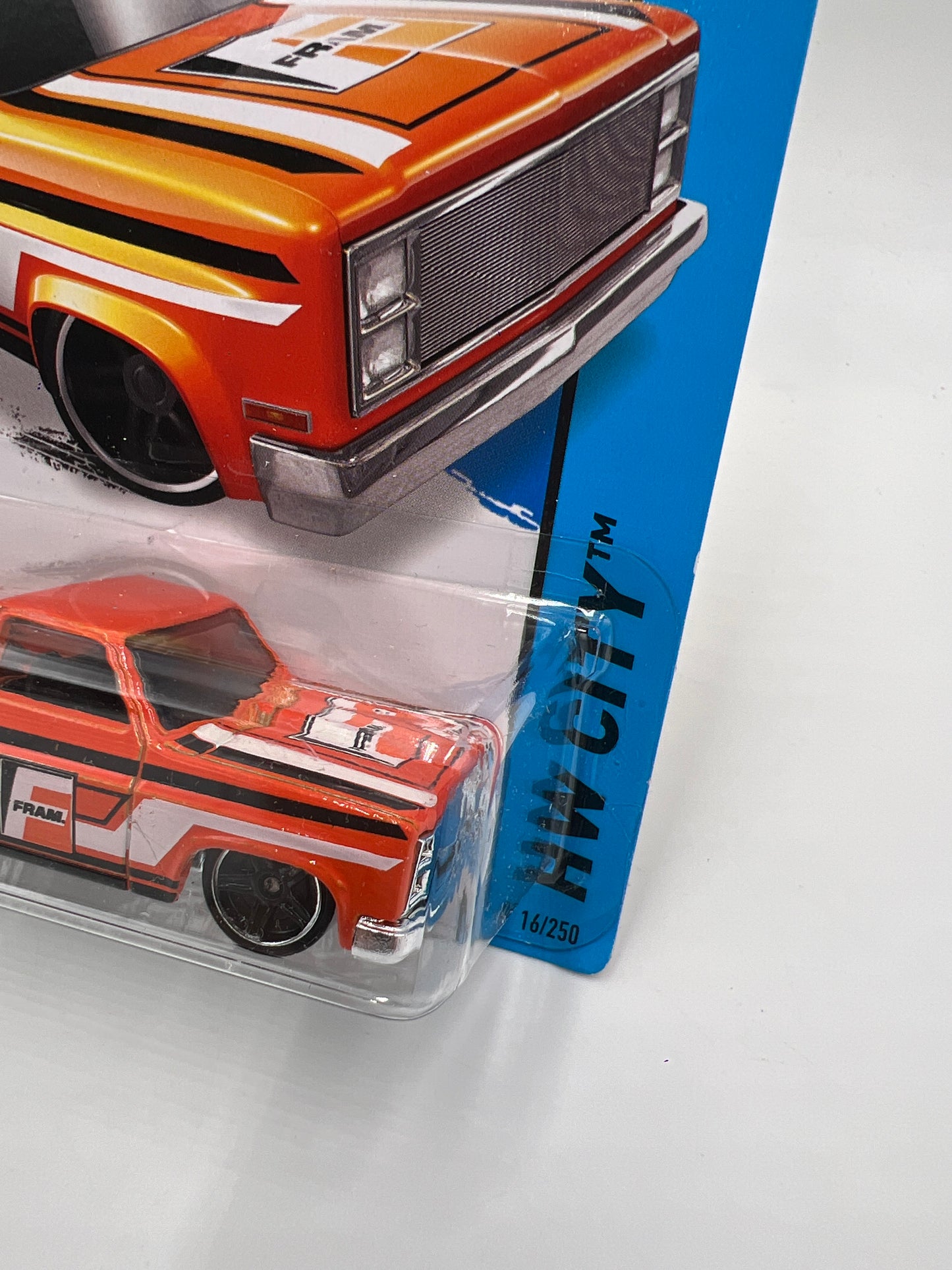 2015 Hot Wheels City #16 83 Chevy Silverado Fram Orange W/Protector 1