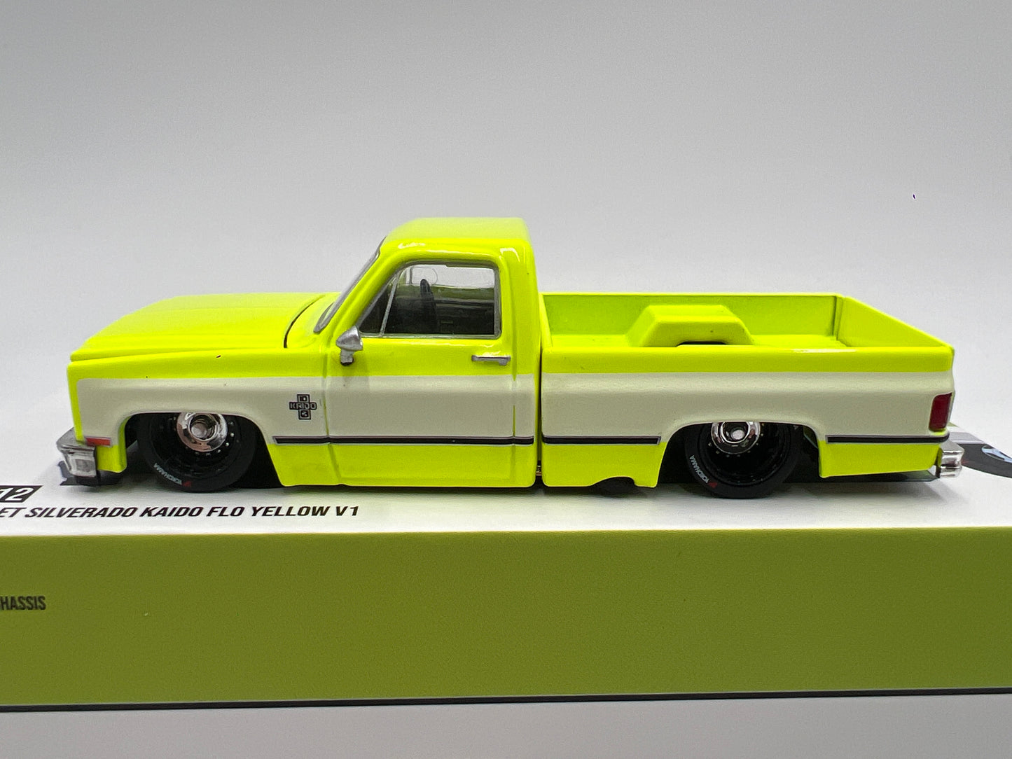 Mini GT x Kaido House #112 Chevrolet Silverado Kaido Flo Yellow V1
