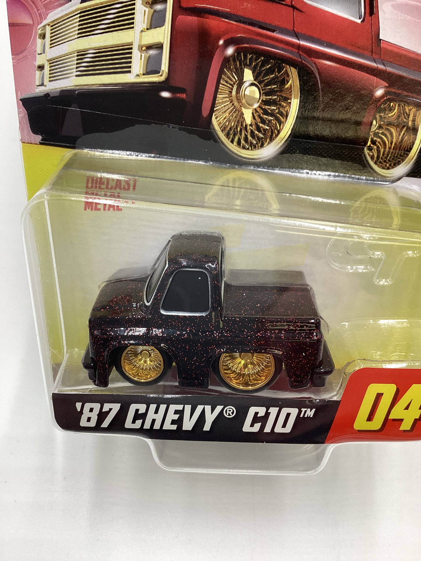 2024 Car Tuned Series 1 #04 87 Chevy C10 Black / Red Metal Flake Walgreens Exclusive with protector