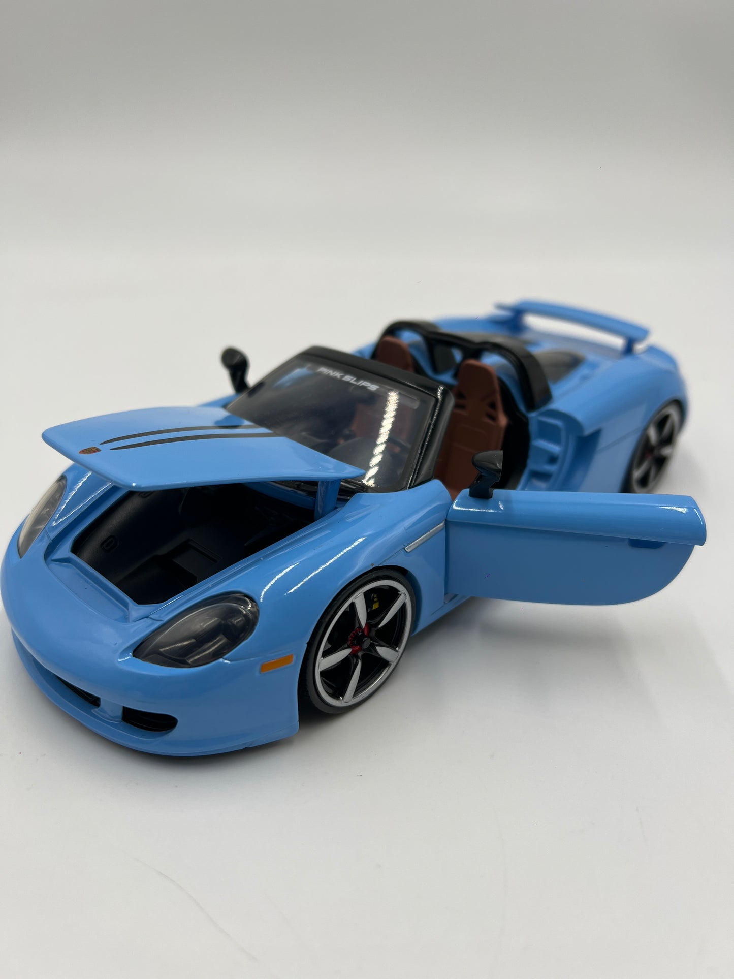 Jada Toys 1/24 Scale Pink Slips Porsche Carrera GT Light Blue Loose