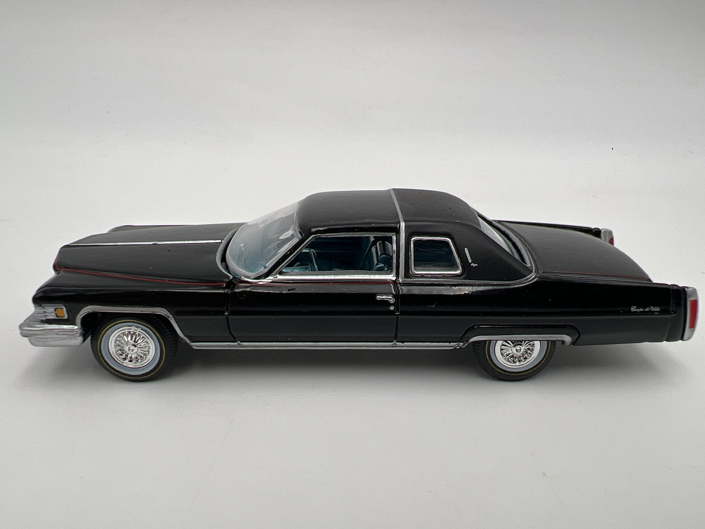 Auto World 1/64 Land Yachts 1976 Cadillac Coupe DeVille Black Loose
