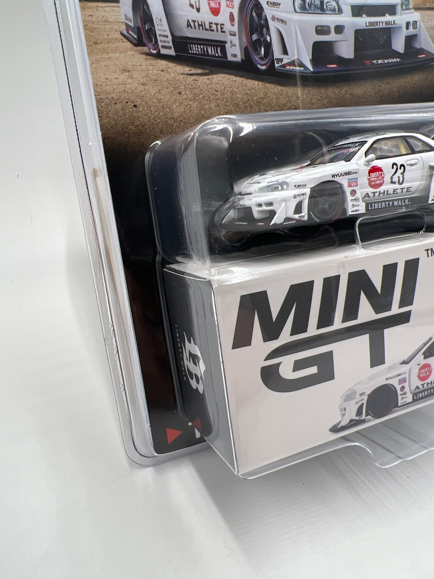 Mini GT #1059 Nissan LB-ER34 Super Silhouette Athlete/Collet White