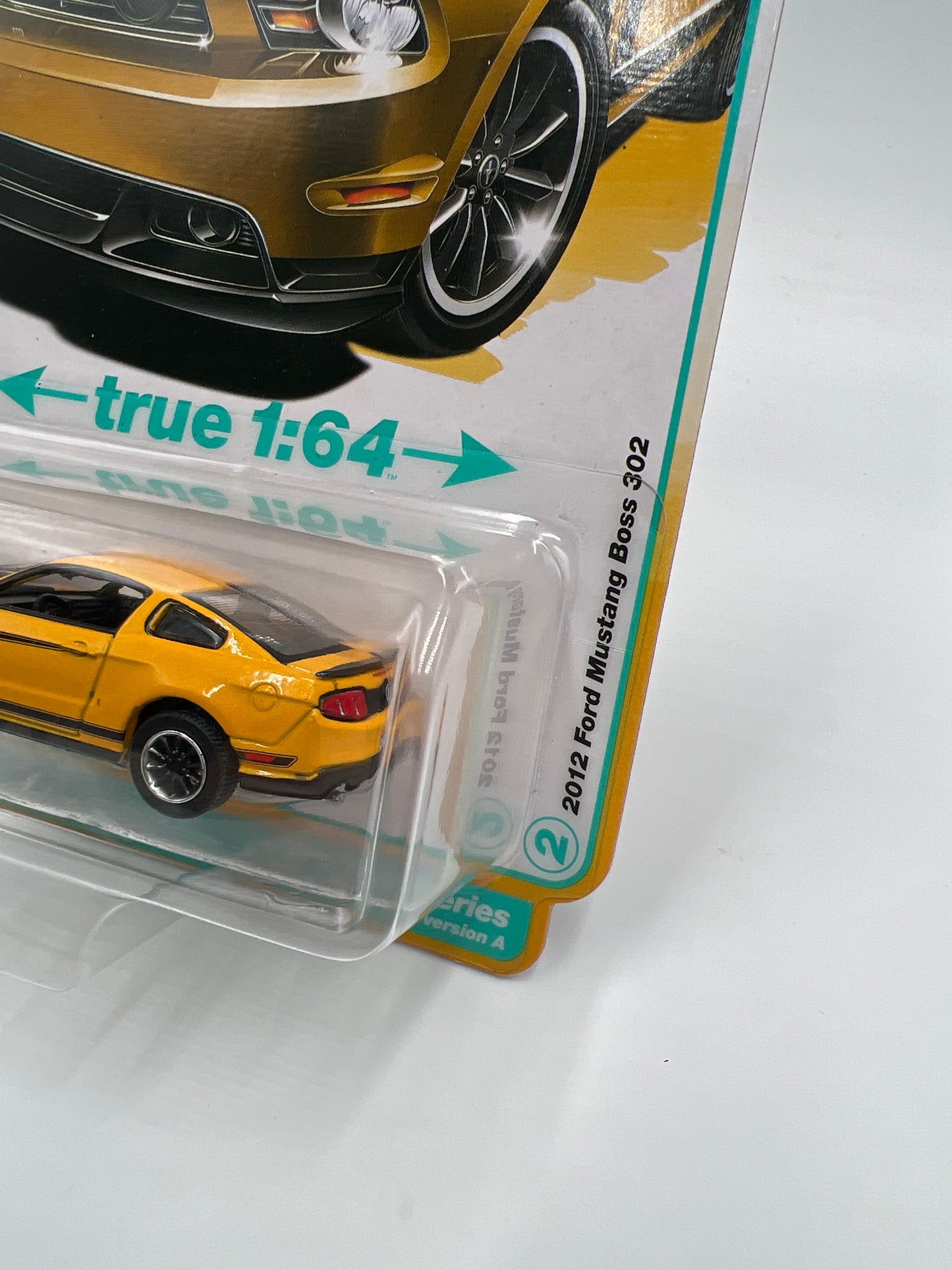2025 Auto World Modern Muscle Release 1 Version A 2012 Ford Mustang Boss 302 Yellow 184E
