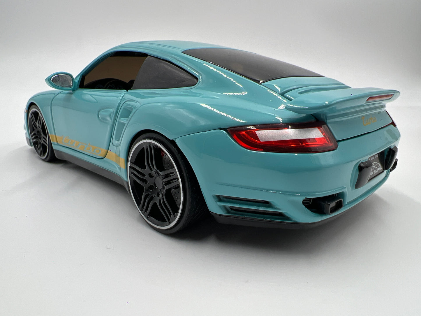 Jada Toys 1/24 Scale Pink Slips 2007 Porsche 911 Turbo Light Blue Loose