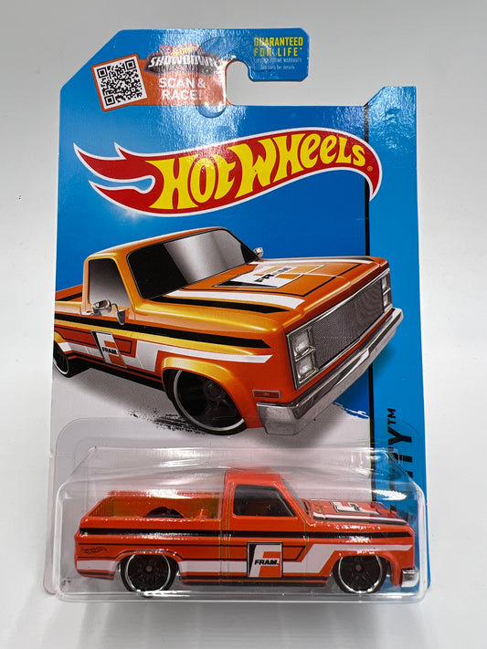 2015 Hot Wheels City #16 83 Chevy Silverado Fram Orange W/Protector 2
