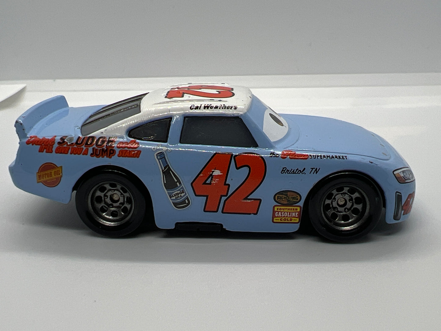 Disney Pixar Cars Thomasville Racing Legends #42 Cal Weathers Light Blue Loose