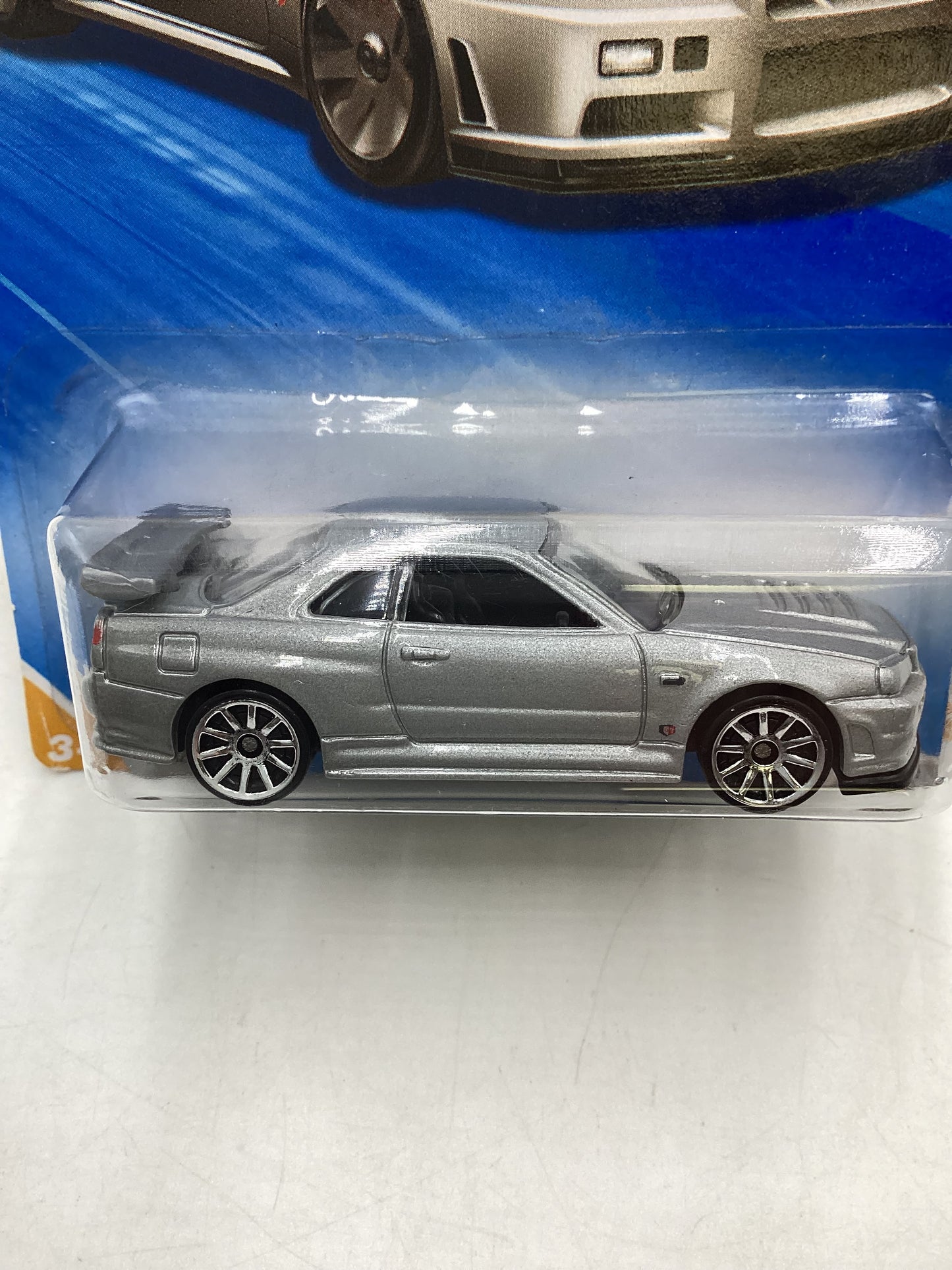 2010 Hot Wheels #007 Silver Nissan Skyline GT-R R34 W/Protector