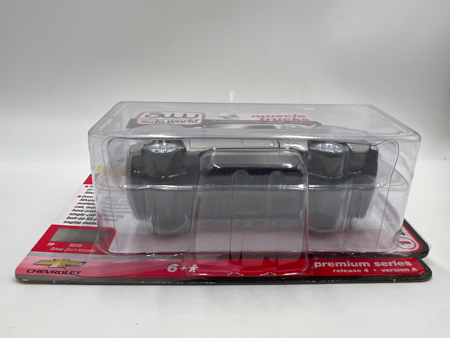Auto World Muscle Trucks Release 4 Version A Cateye 2006 Chevy Silverado SS Silver 183C