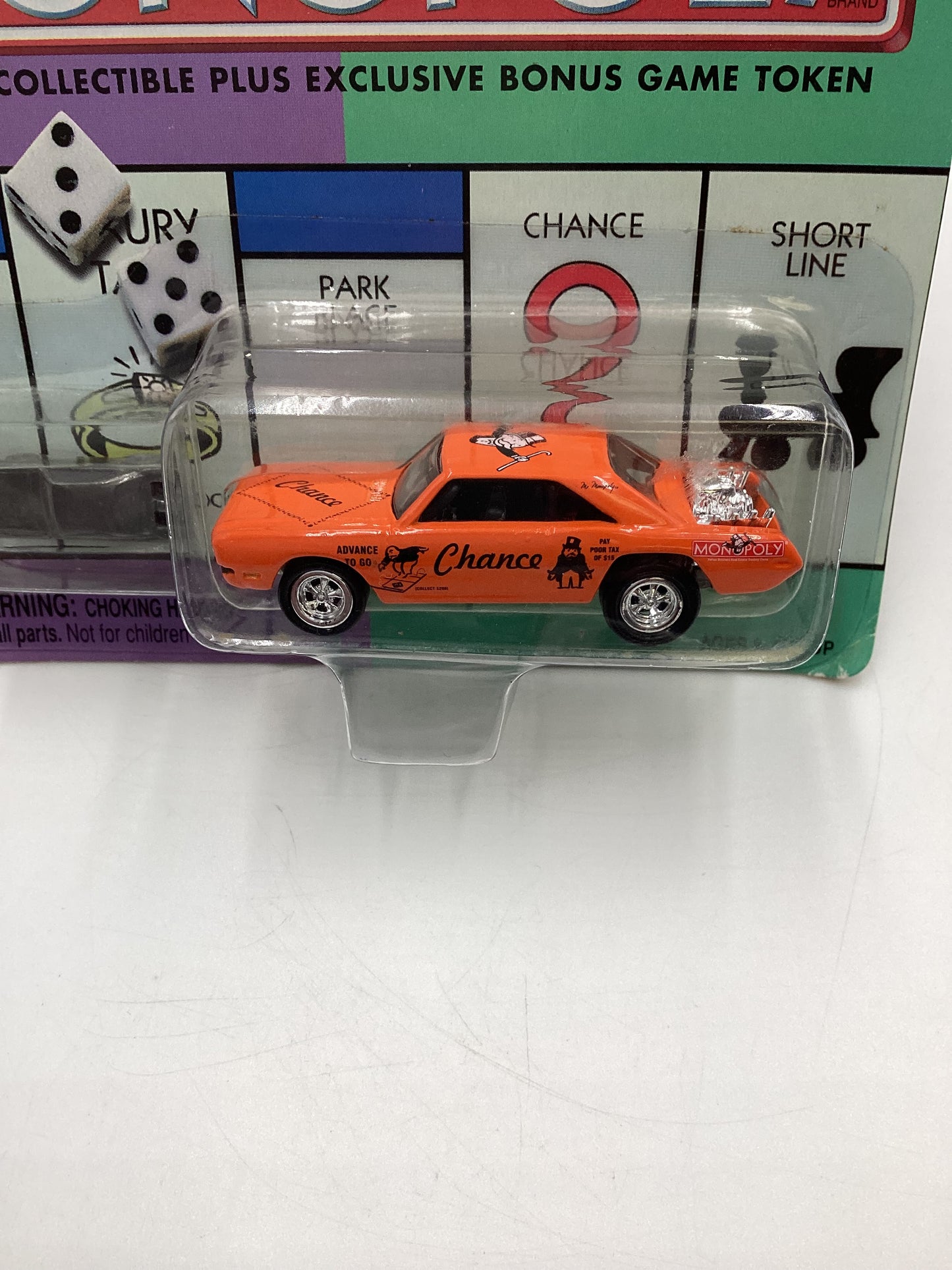 Johnny Lightning Monopoly Chance W/Token 1970 Dodge Dart Orange