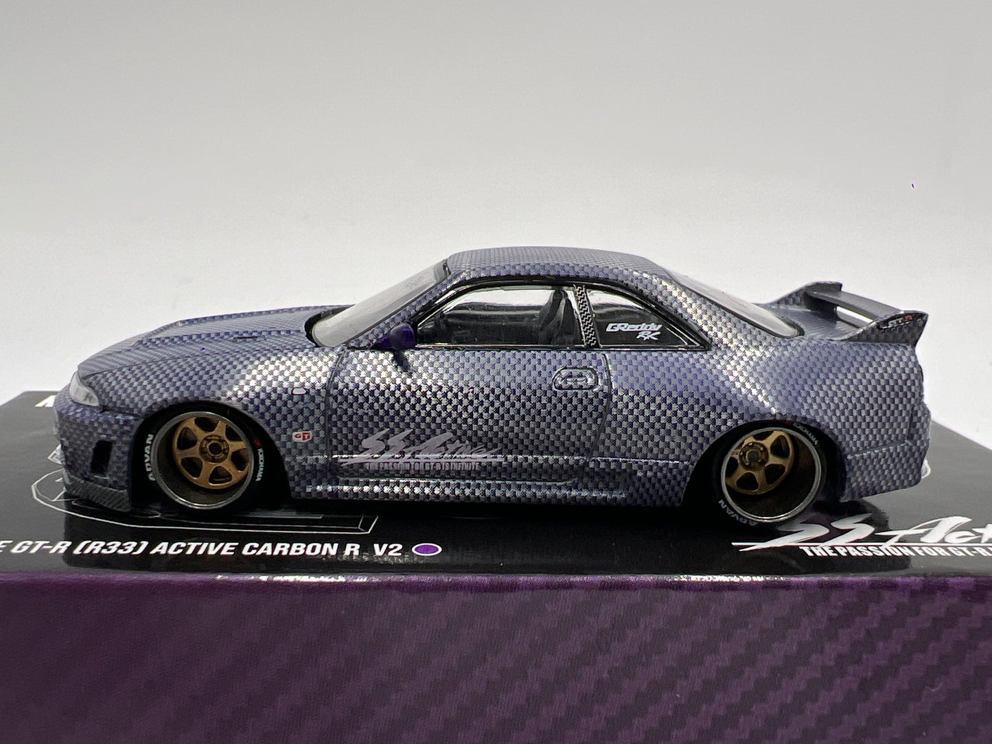 Mini GT x Kaido House #163 CHASE Nissan Skyline GT-R R33 Active Carbon R V2