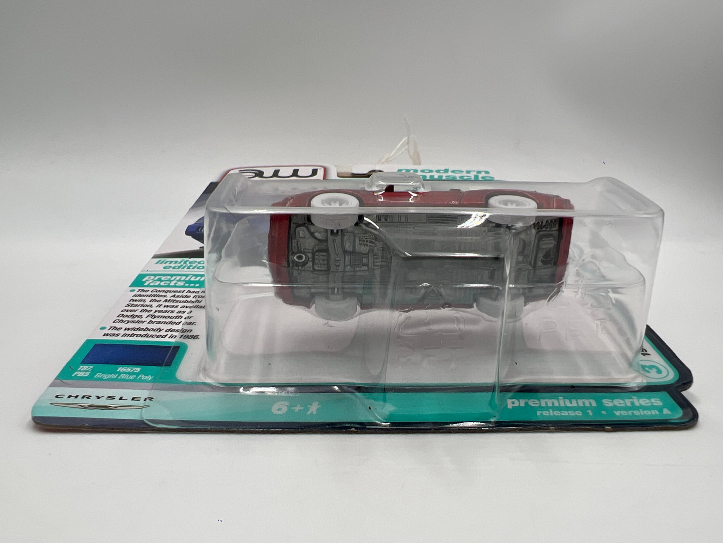 2025 Auto World Modern Muscle CHASE Release 1 Version A 1988 Chrysler Conquest TSi Ultra Red