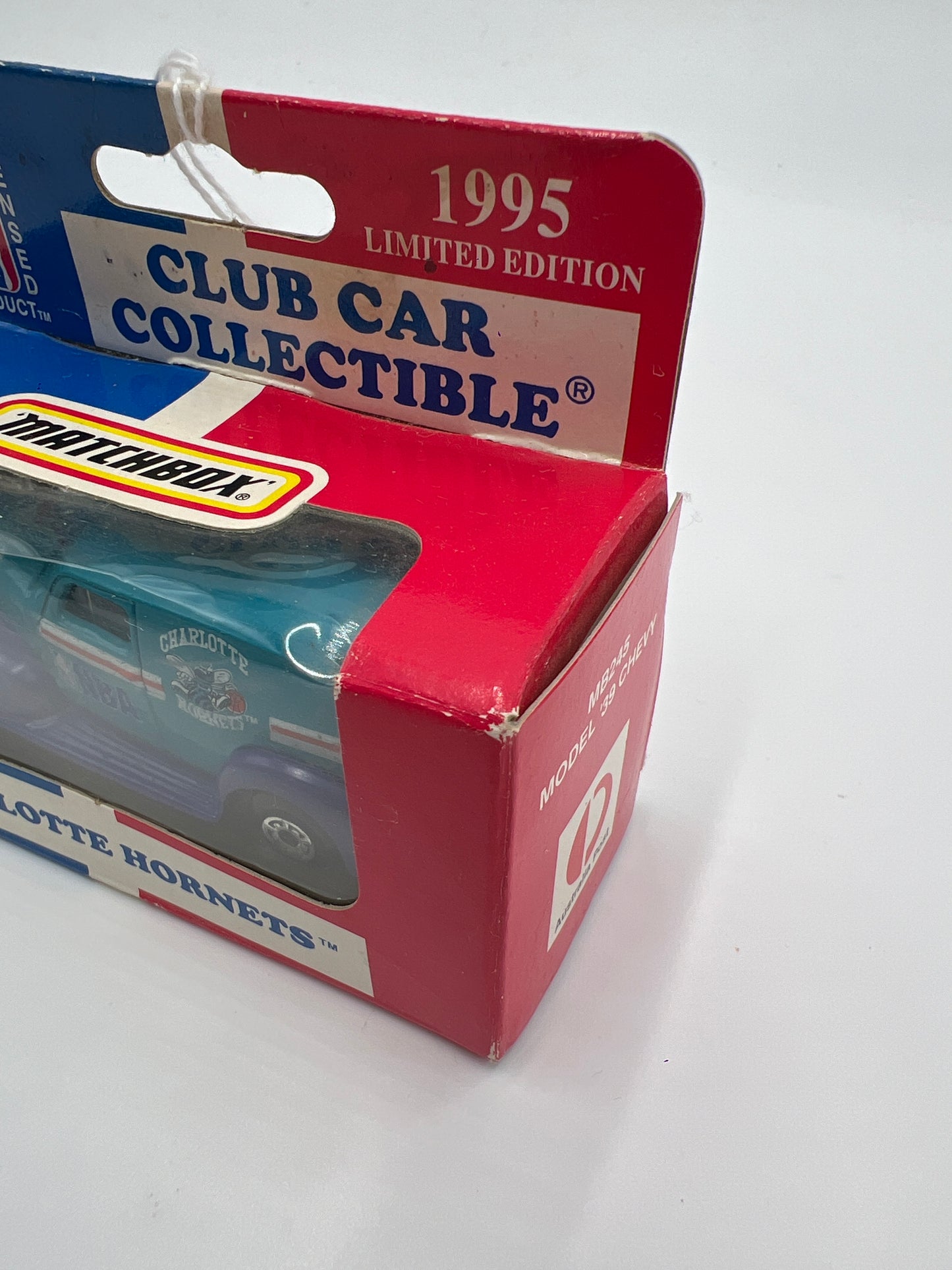 Matchbox 1995 NBA Club Car Collectible MB245 Model 39 Chevy Charlotte Hornets Blue (Cracked Blister)