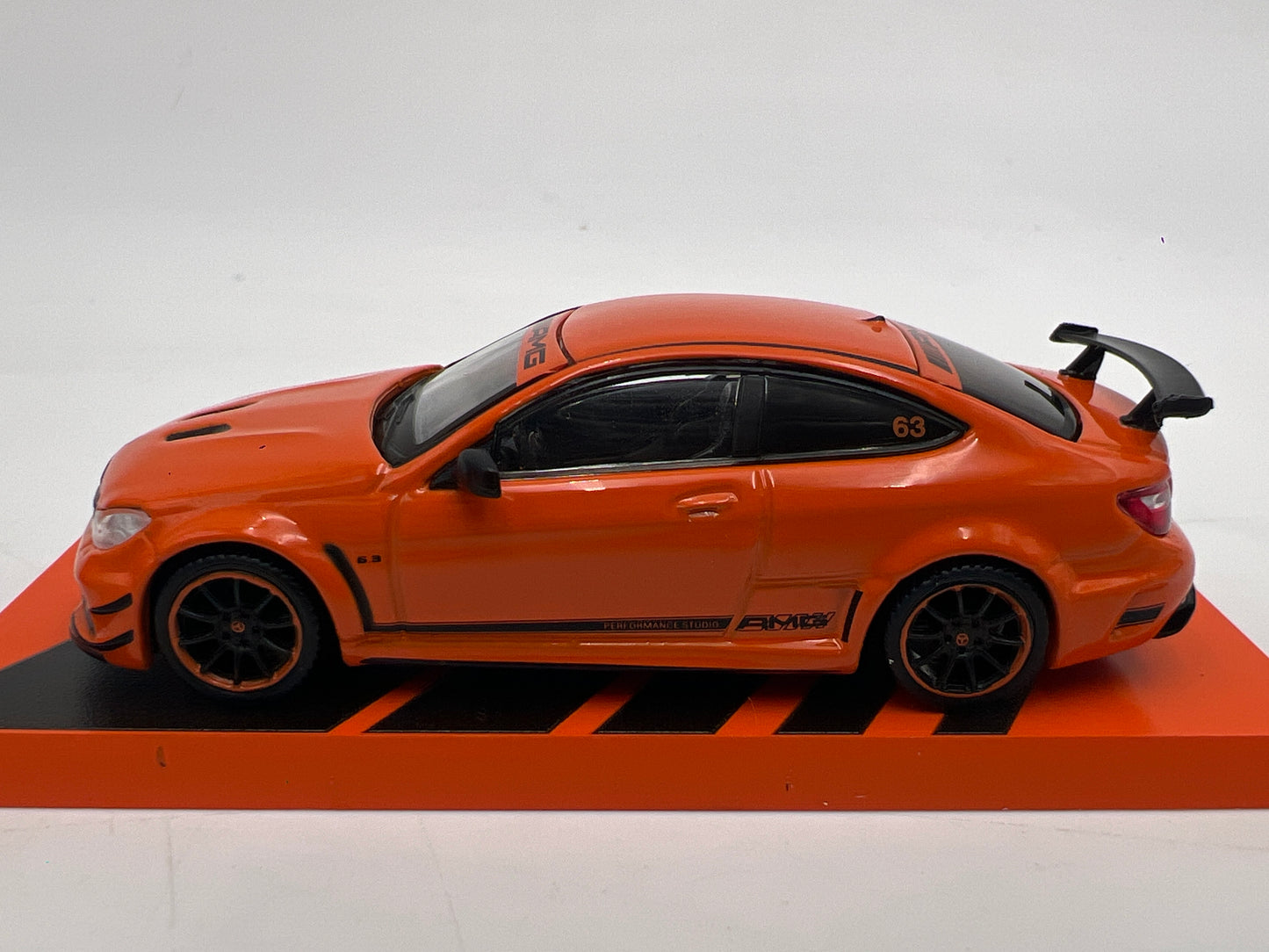 Tarmac Works x Global 64 Mercedes-Benz C 63 AMG Coupe Black Series Orange