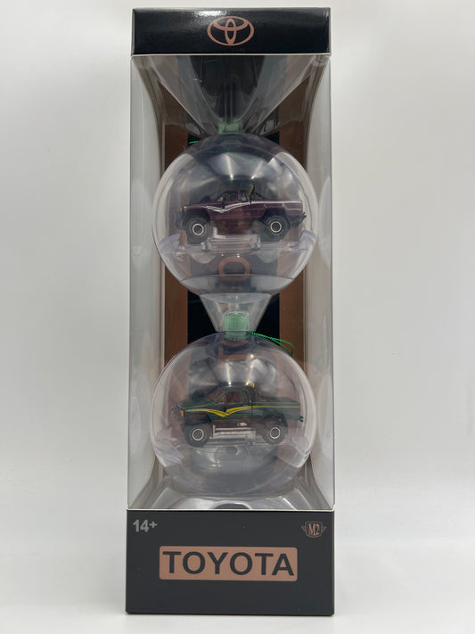 2026 M2 Machines Christmas Holiday Ornaments 2 Pack 1985 Toyota 4x4 Truck