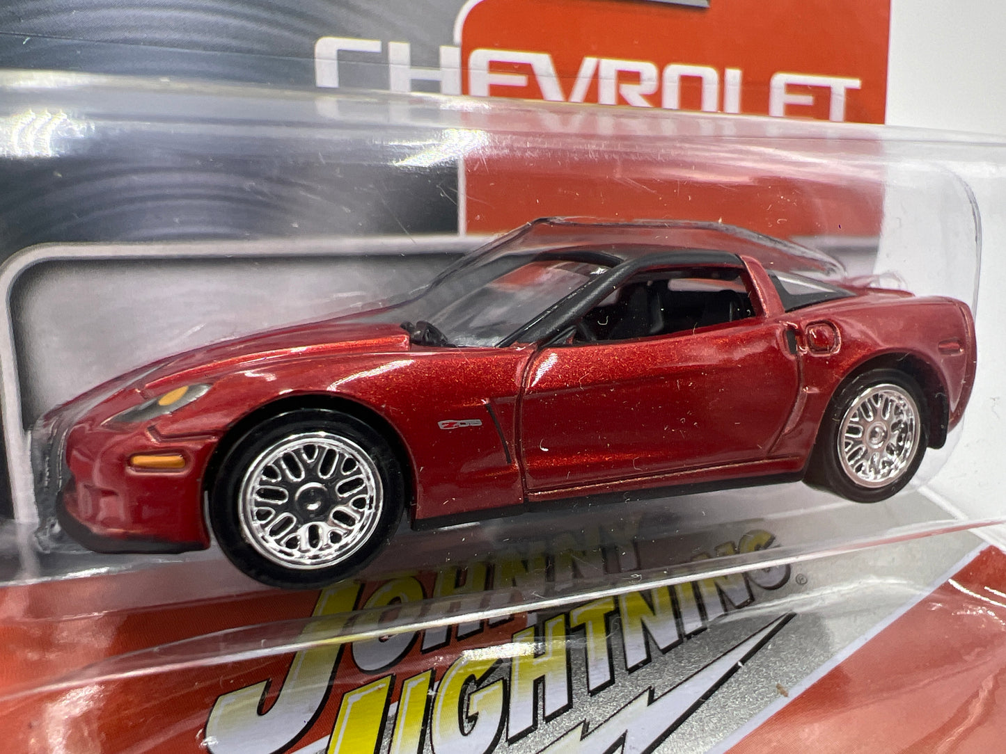 Johnny Lightning Storage Tin Release 1 Version B #1 2012 Chevy Corvette Z06 Orange 228F