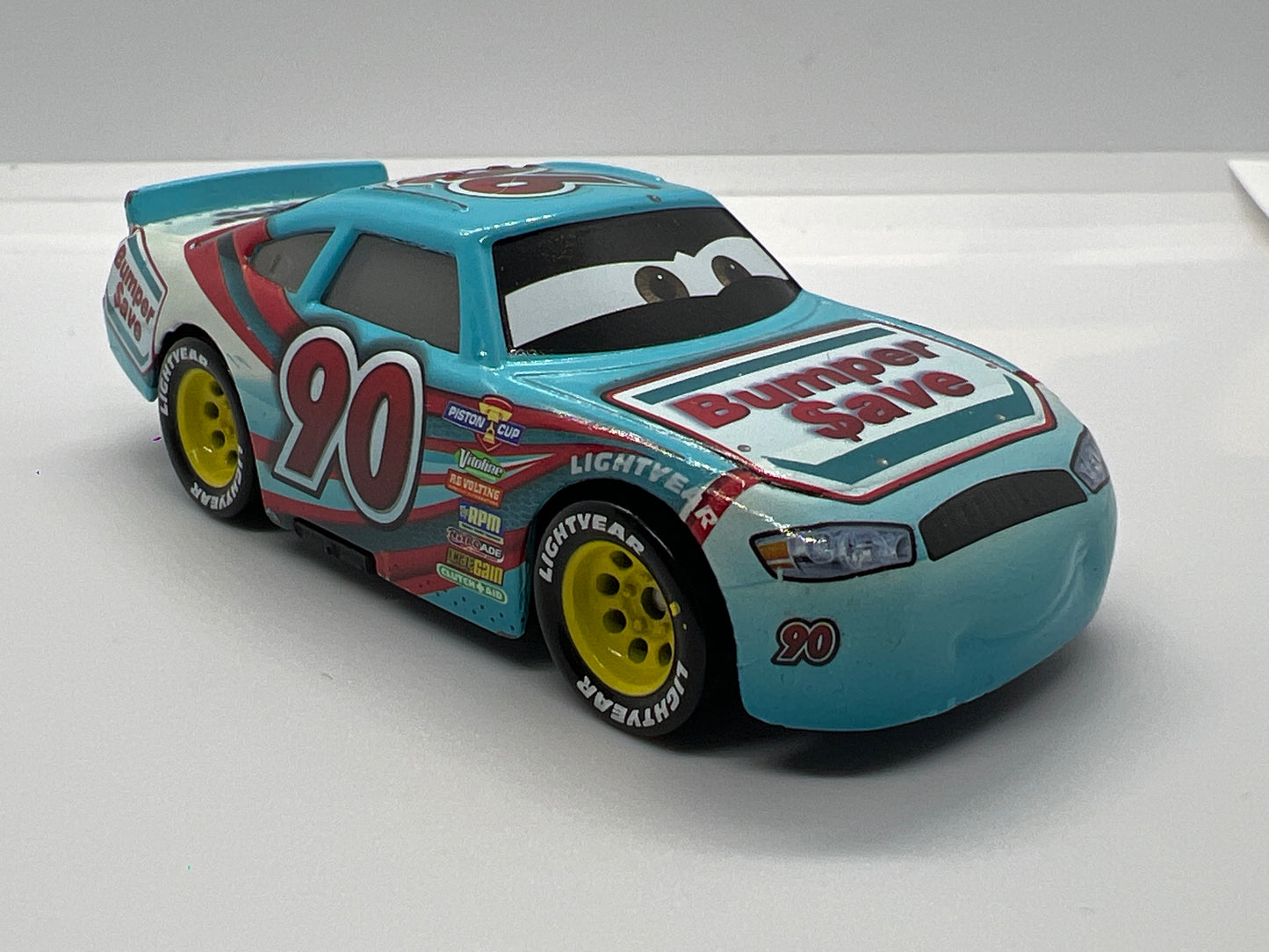 Disney Pixar Cars 3 #90 Ponchy Wipeout Bumper $ave Light Blue Loose