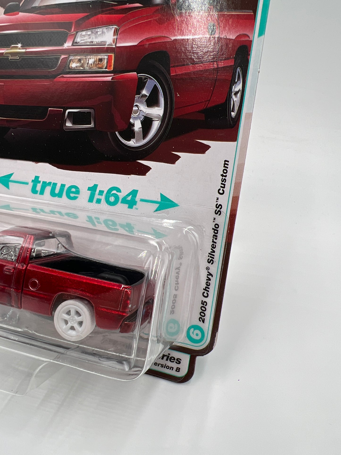 2025 Auto World Muscle Trucks CHASE Release 1 Version B 2005 Chevy Silverado SS Custom Ultra Red Cateye