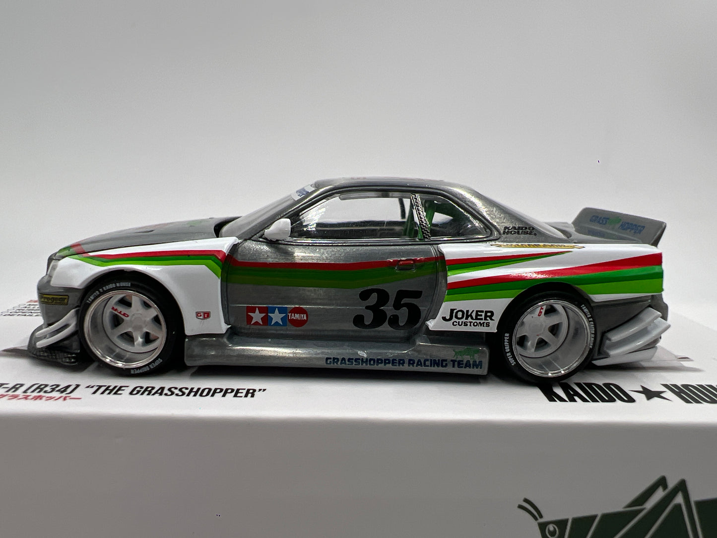 Mini GT Kaido House x Tamiya Collab #167 CHASE Nissan Skyline GT-R R34 The Grasshopper