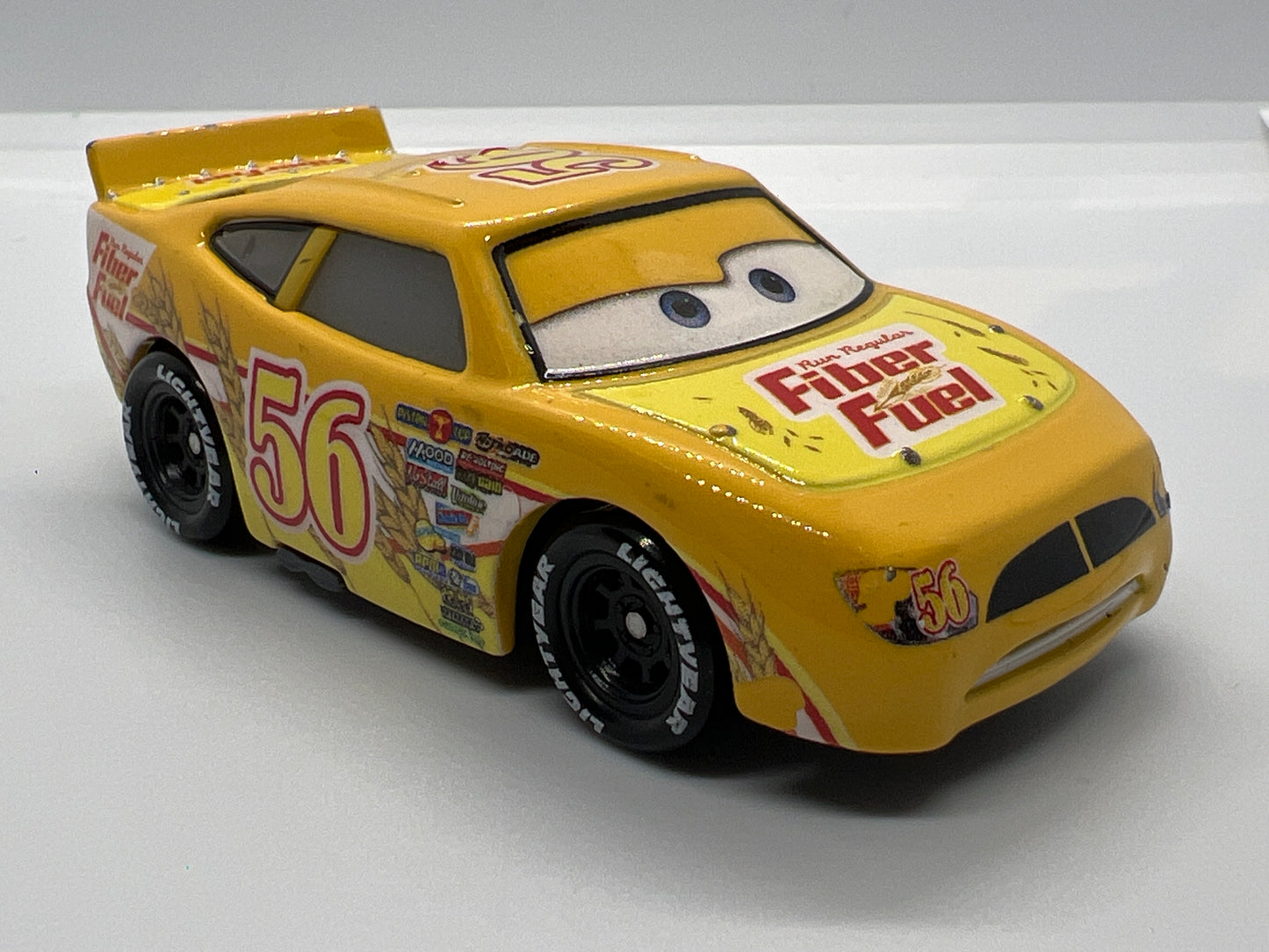 Disney Pixar Cars #42 Brusho Curber Fiber Fuel Yellow Loose