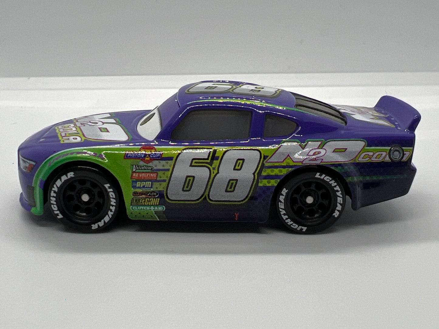 Disney Pixar Cars 3 #68 Parker Brakeston N20 Cola Purple Loose