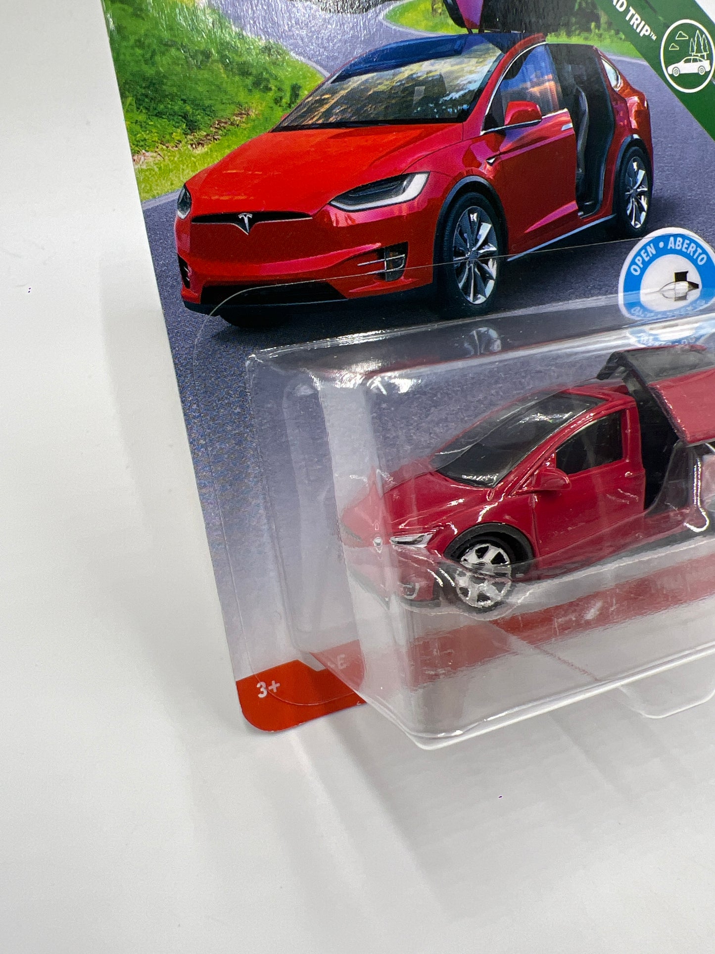 Matchbox Moving Parts MBX Road Trip Tesla Model X Red W/Protector