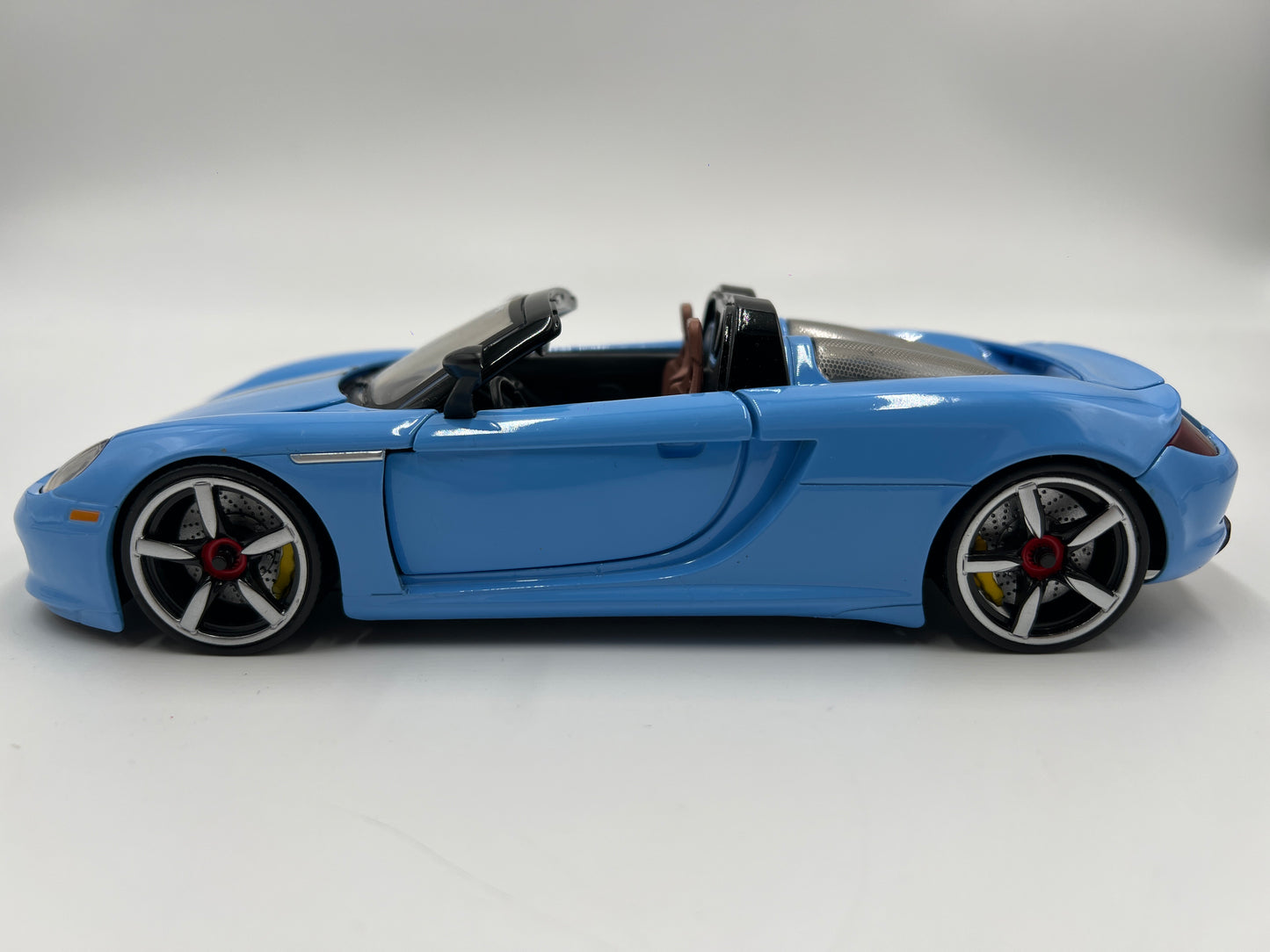 Jada Toys 1/24 Scale Pink Slips Porsche Carrera GT Light Blue Loose