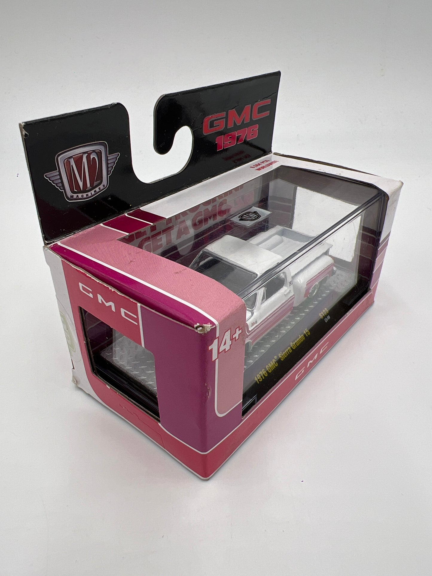 M2 Machines OReillys Exclusive 1976 GMC Sierra Grande 15 White/Pink W/Protector Bad Box S123