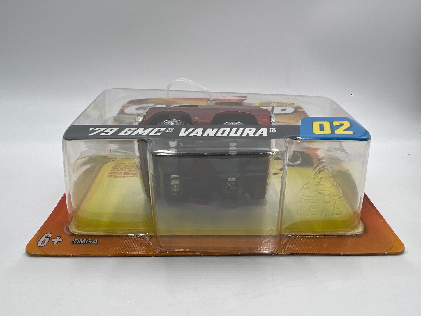 2025 MGA Car Tuned Series 3 #2 79 GMC Vandura Orange 179B