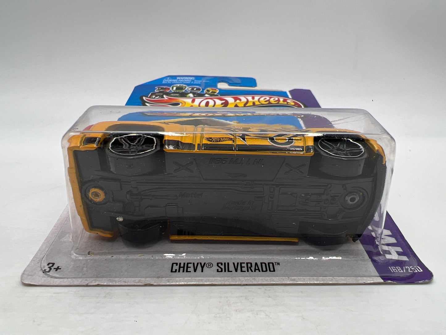 2013 Hot Wheels Showroom #168 Chevy Silverado Yellow W/Protector