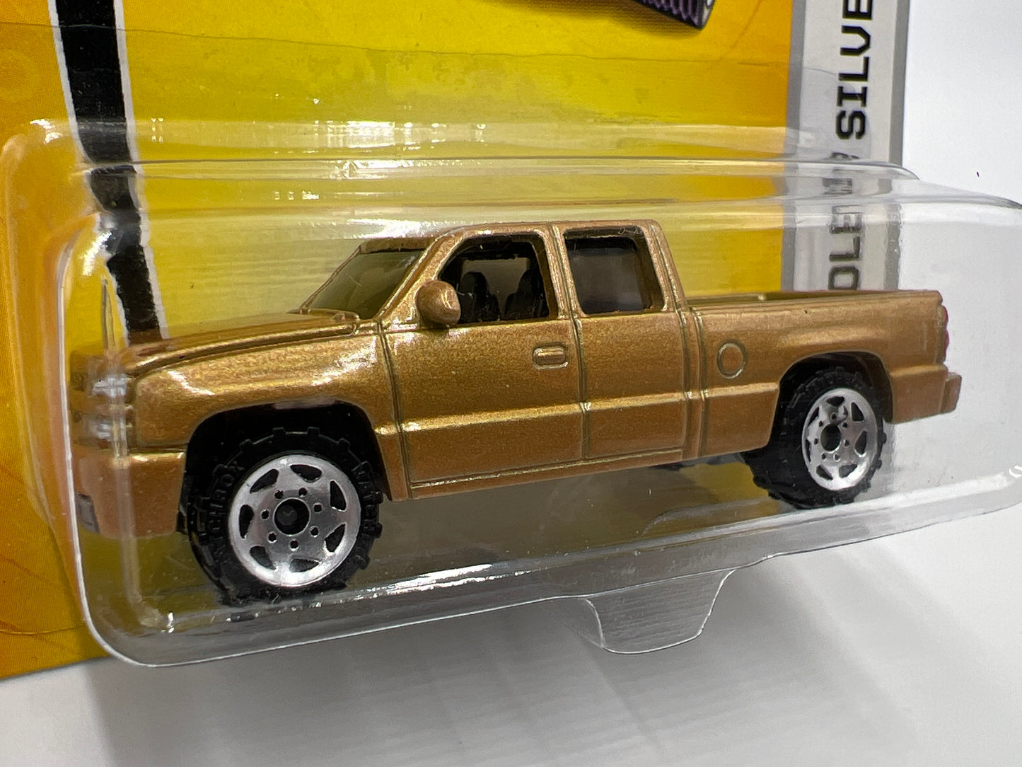 Matchbox MBX Metal #10 Chevrolet Silverado SS Gold Cateye W/Protector