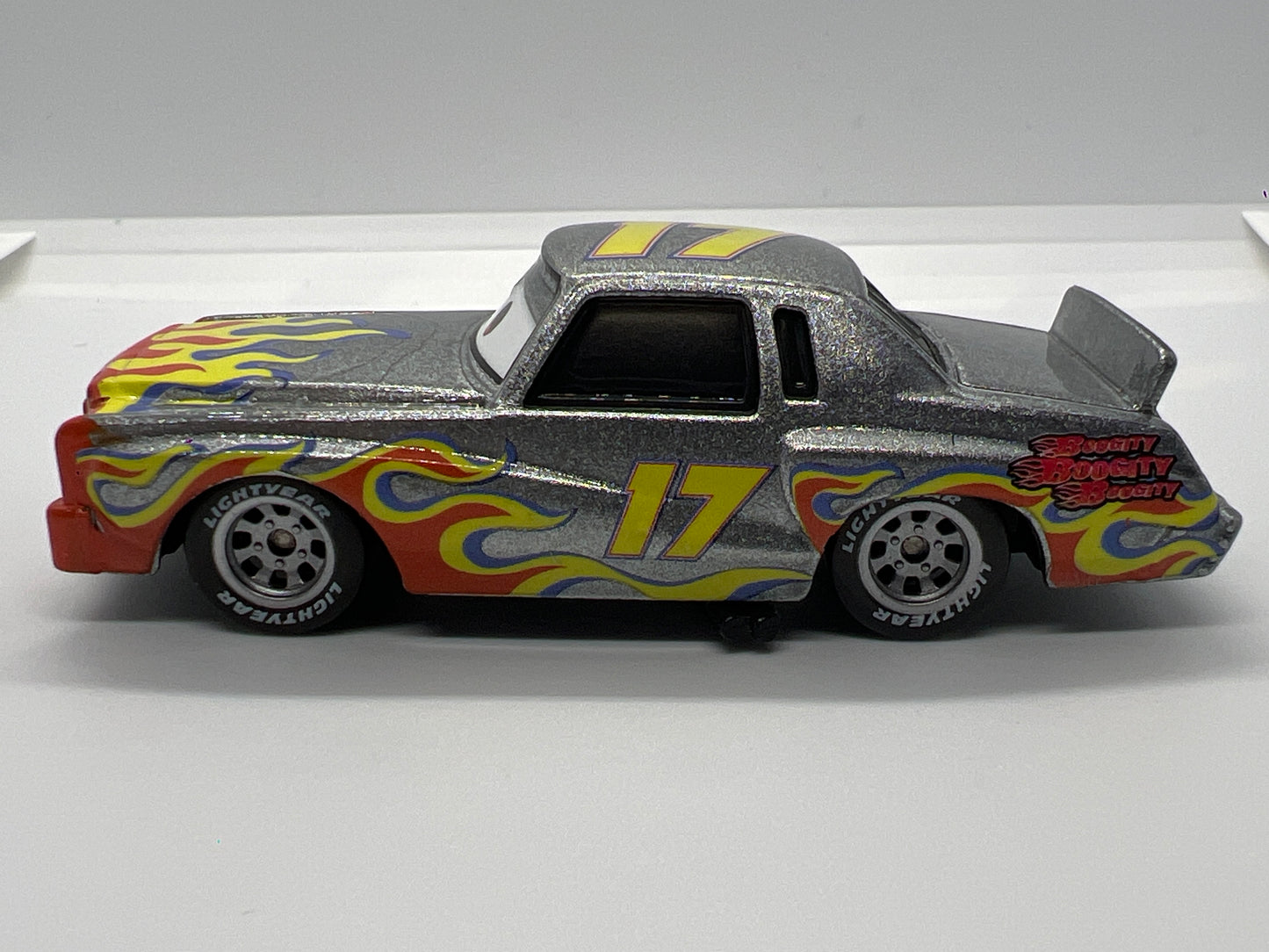 Disney Pixar Cars #17 Darrel Cartrip Silver/Flames Loose