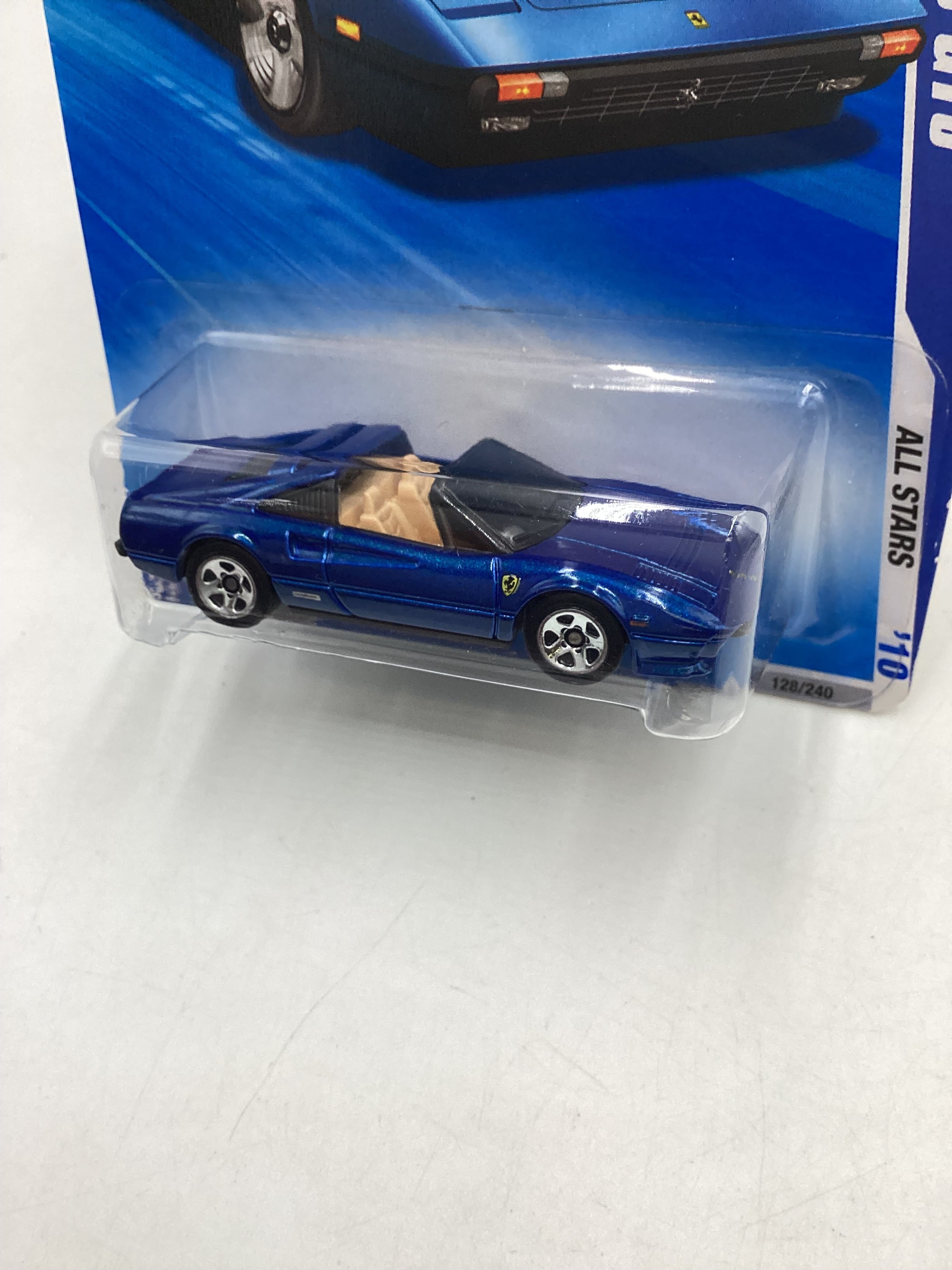 2010 Hot Wheels #128 Blue Ferrari 308 GTS with protector