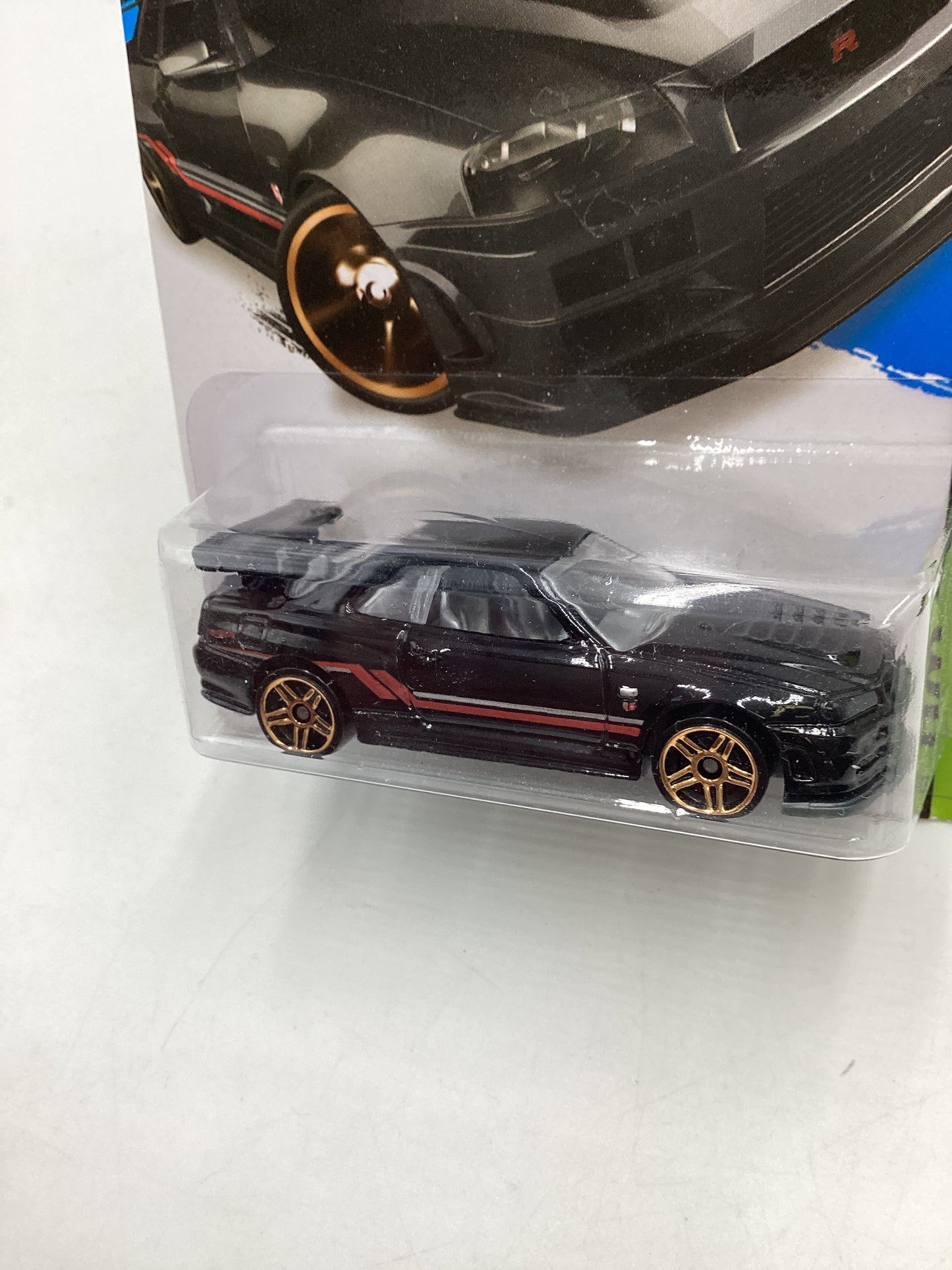 2014 Hot Wheels #230 Nissan Skyline GT-R (R34) Black with Protector