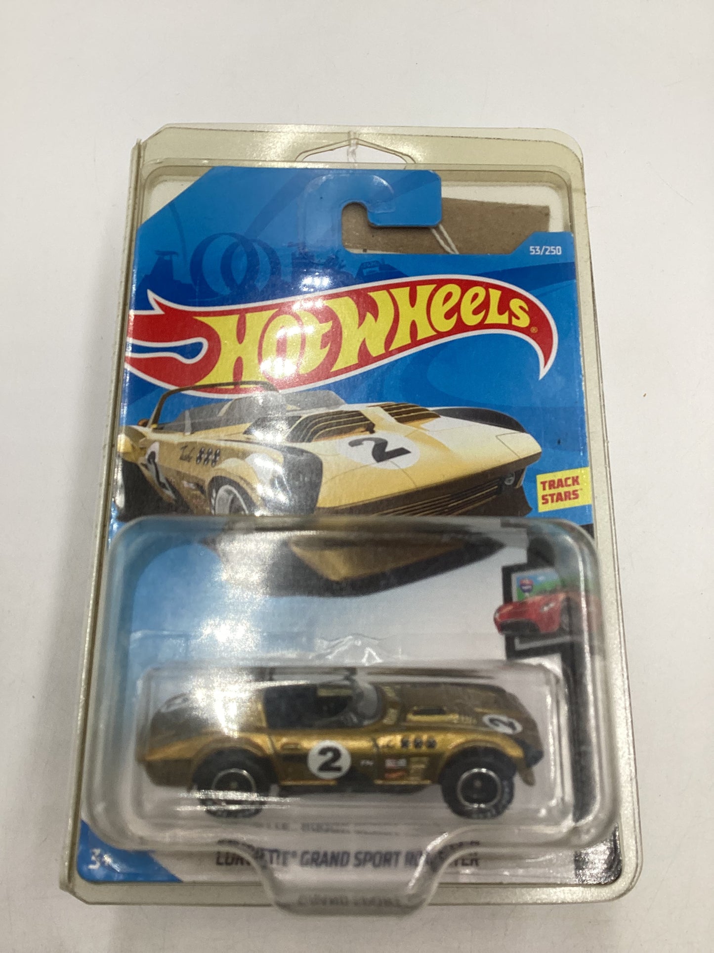 2019 Hot wheels Super treasure hunt #53 Corvette Grand Sport Roadster Gold W/Protector *Crushed Blister*