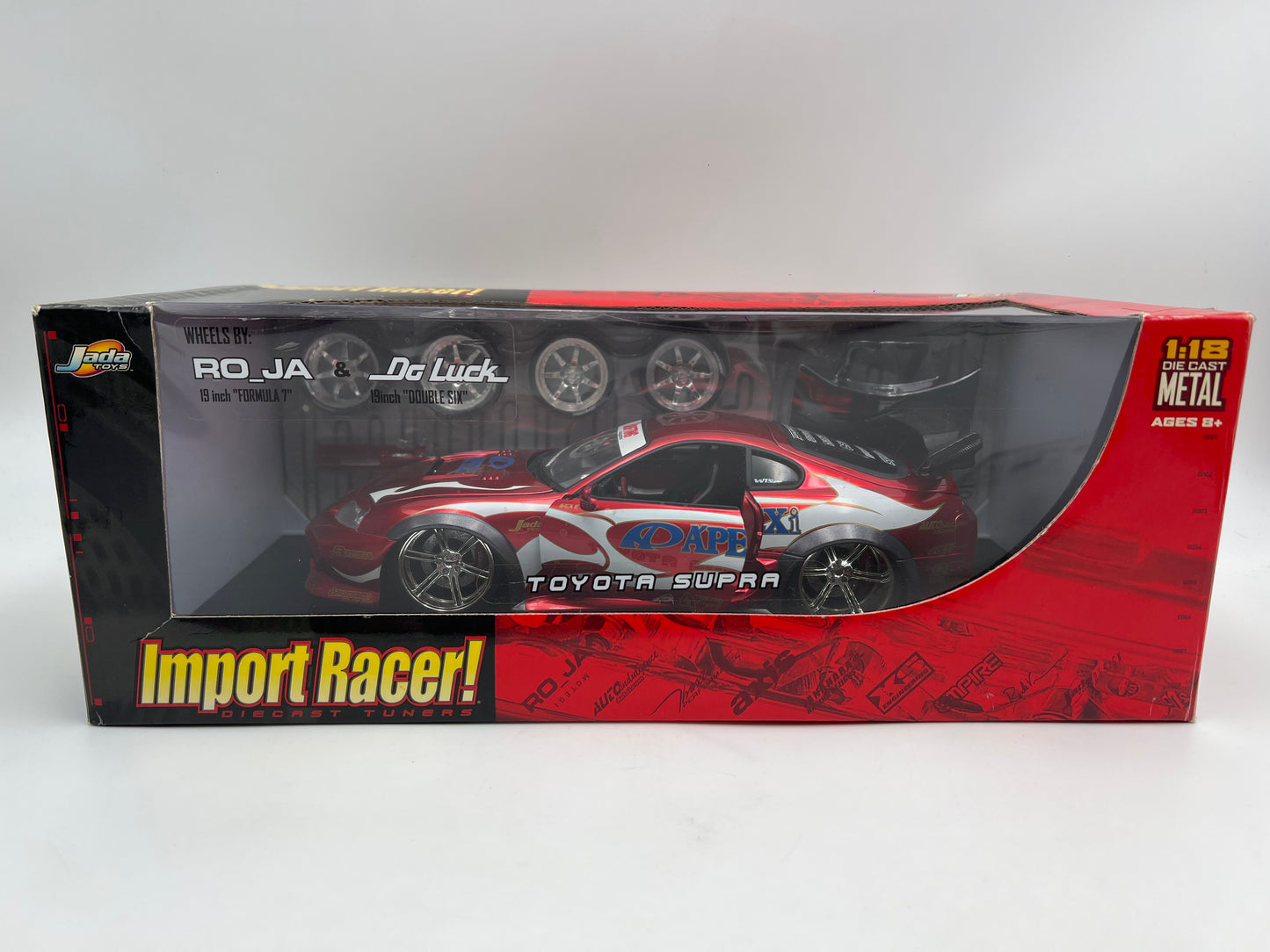 Jada 1:18 Scale Import Racer Toyota Supra Red W/Extra Wheels & Hood