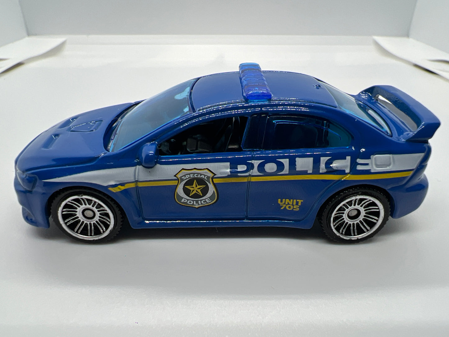 Matchbox 1/64 2010 Mitsubishi Lancer X Blue Police Loose