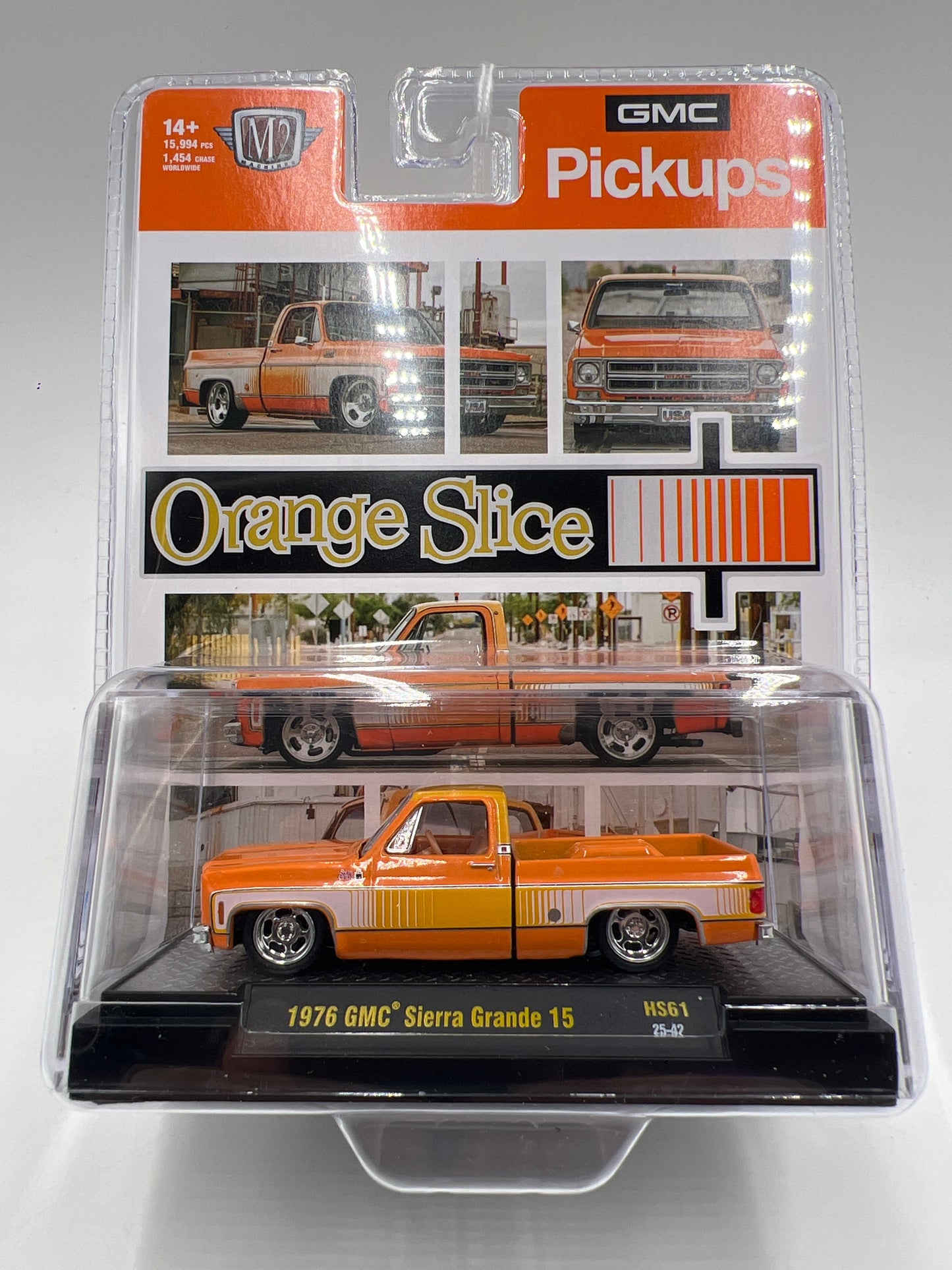 M2 Machines Hobby Exclusive Orange Slice 1976 GMC Sierra Grande 15 HS61 201D