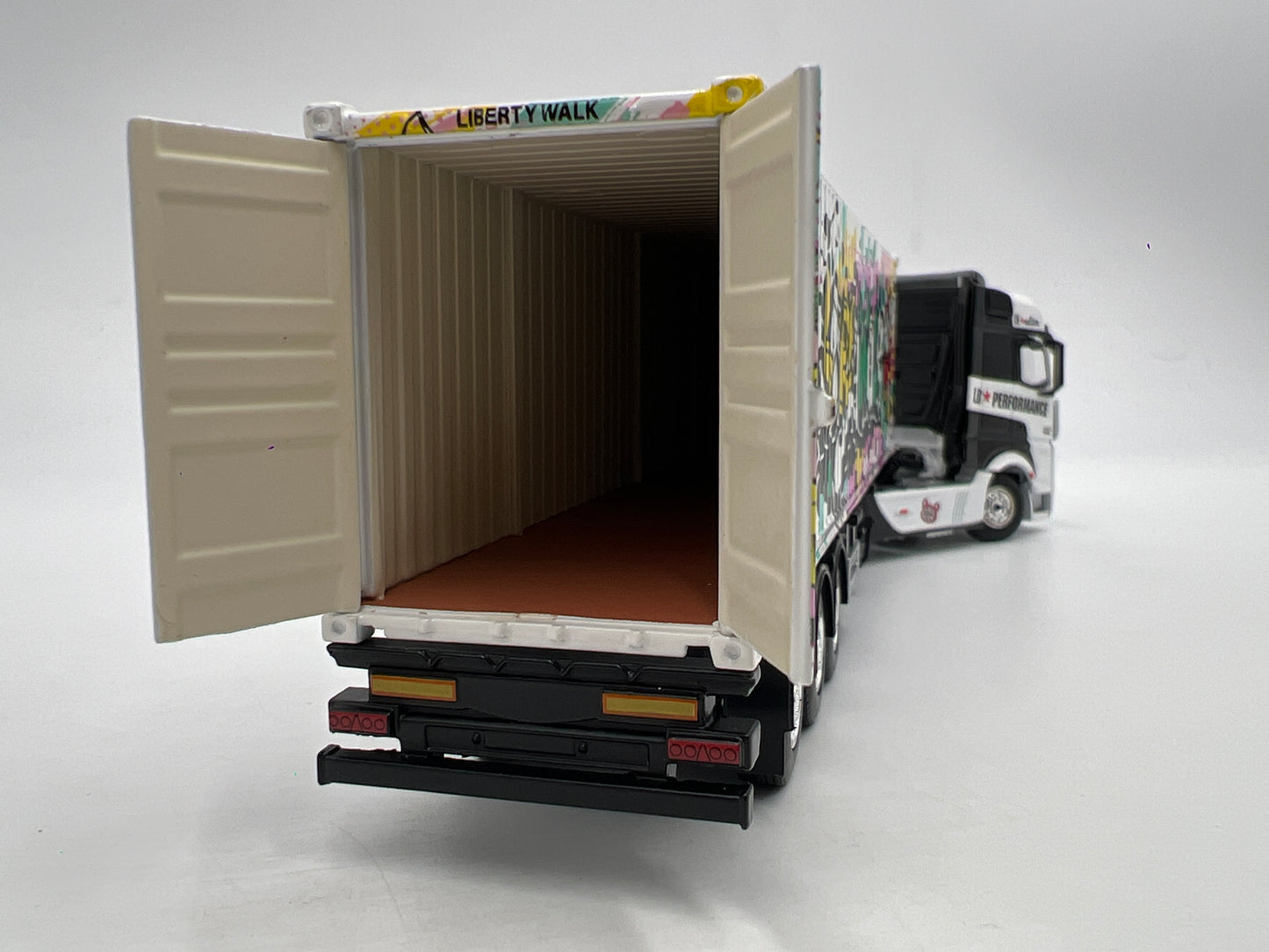 Mini GT #333 Mercedes-Benz Actros W/40ft Container LBWK Kuma Graffiti