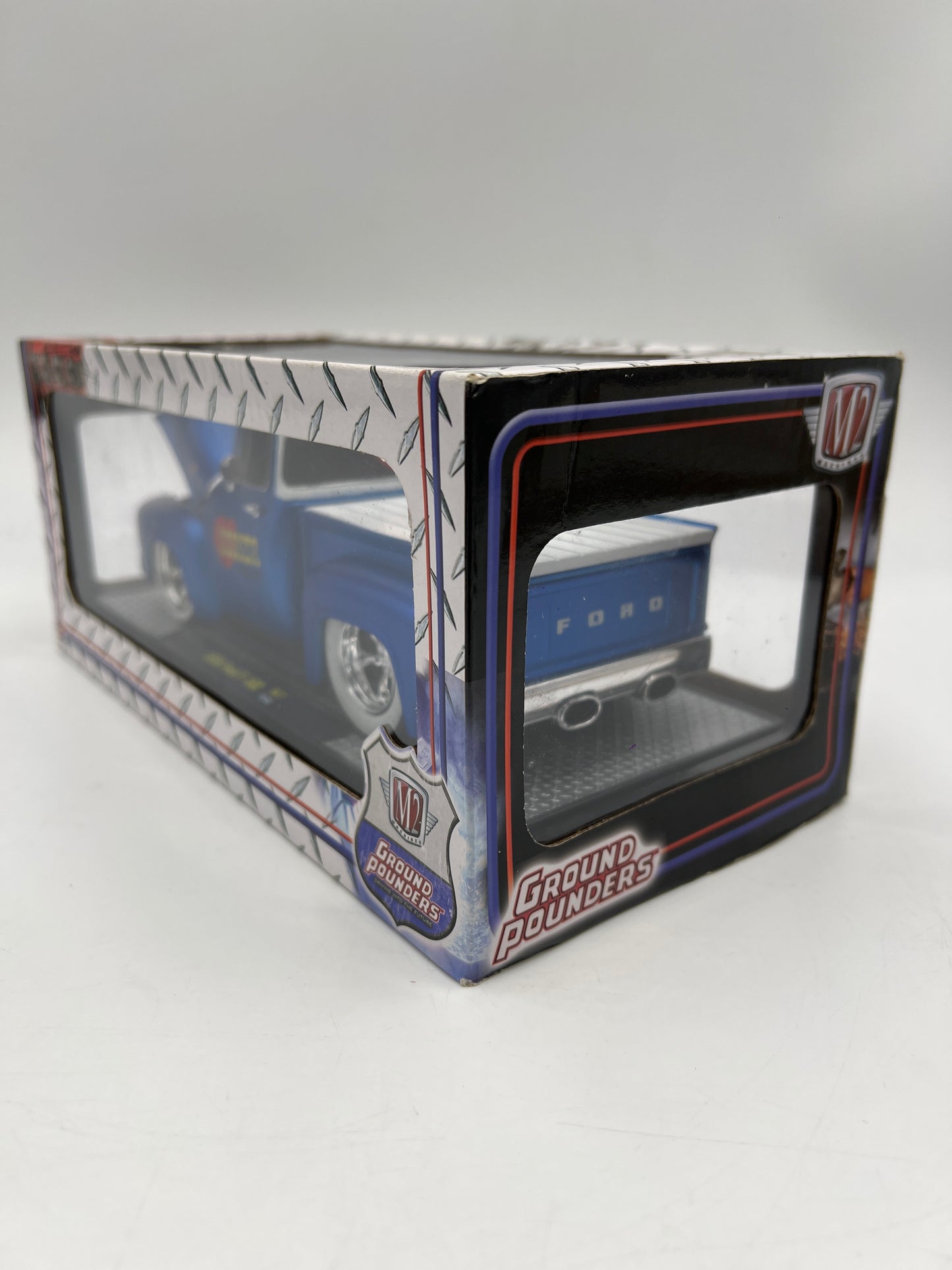 M2 Machines 1/24 Ground Pounders 1956 Ford F-100 Hooker Headers Blue/White R47