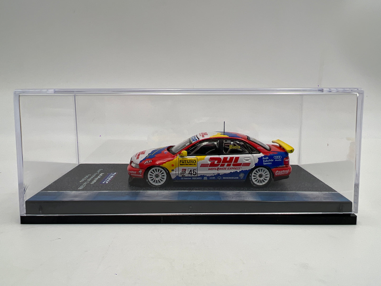 Tarmac Works x Hobby64 Audi A4 Quattro DHL Super Tourenwagen Cup 1998