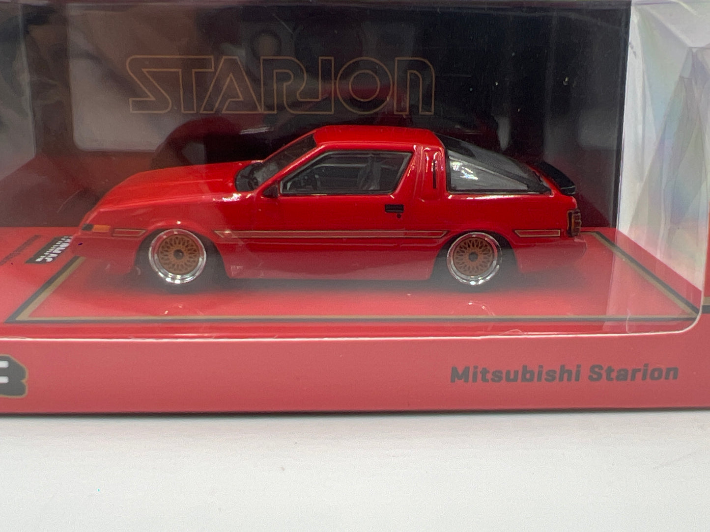 Tarmac Works x Global 64 Acrylic Mitsubishi Starion Red