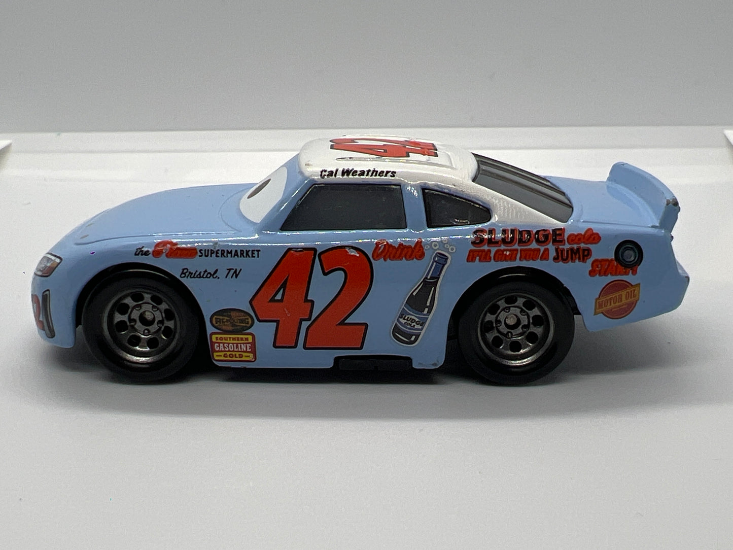 Disney Pixar Cars Thomasville Racing Legends #42 Cal Weathers Light Blue Loose