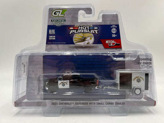 Greenlight Hobby Exclusive Hitch & Tow Hot Pursuit 2023 Chevrolet Silverado W/Small Cargo Trailer 186E