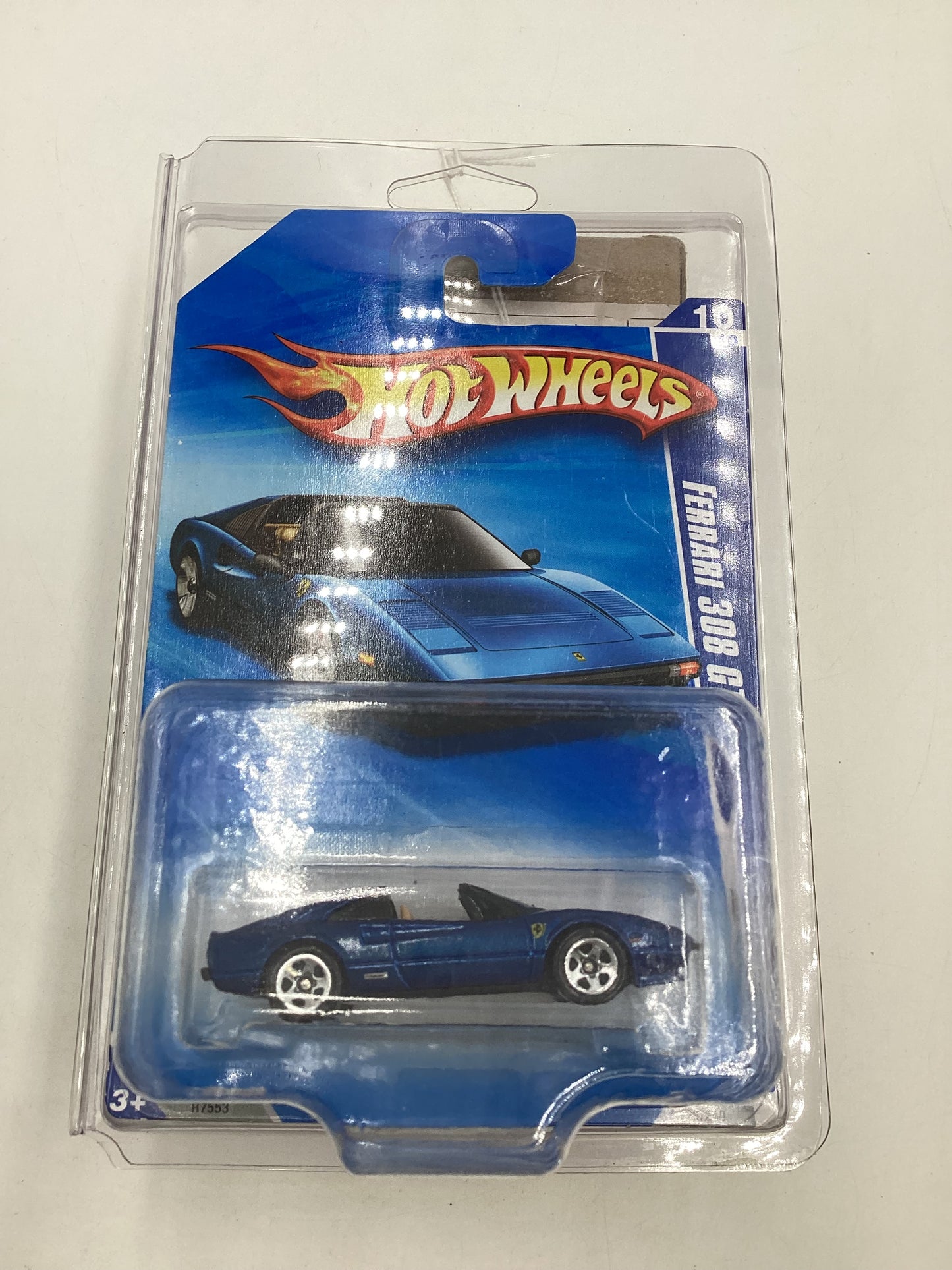 2010 Hot Wheels #128 Blue Ferrari 308 GTS with protector