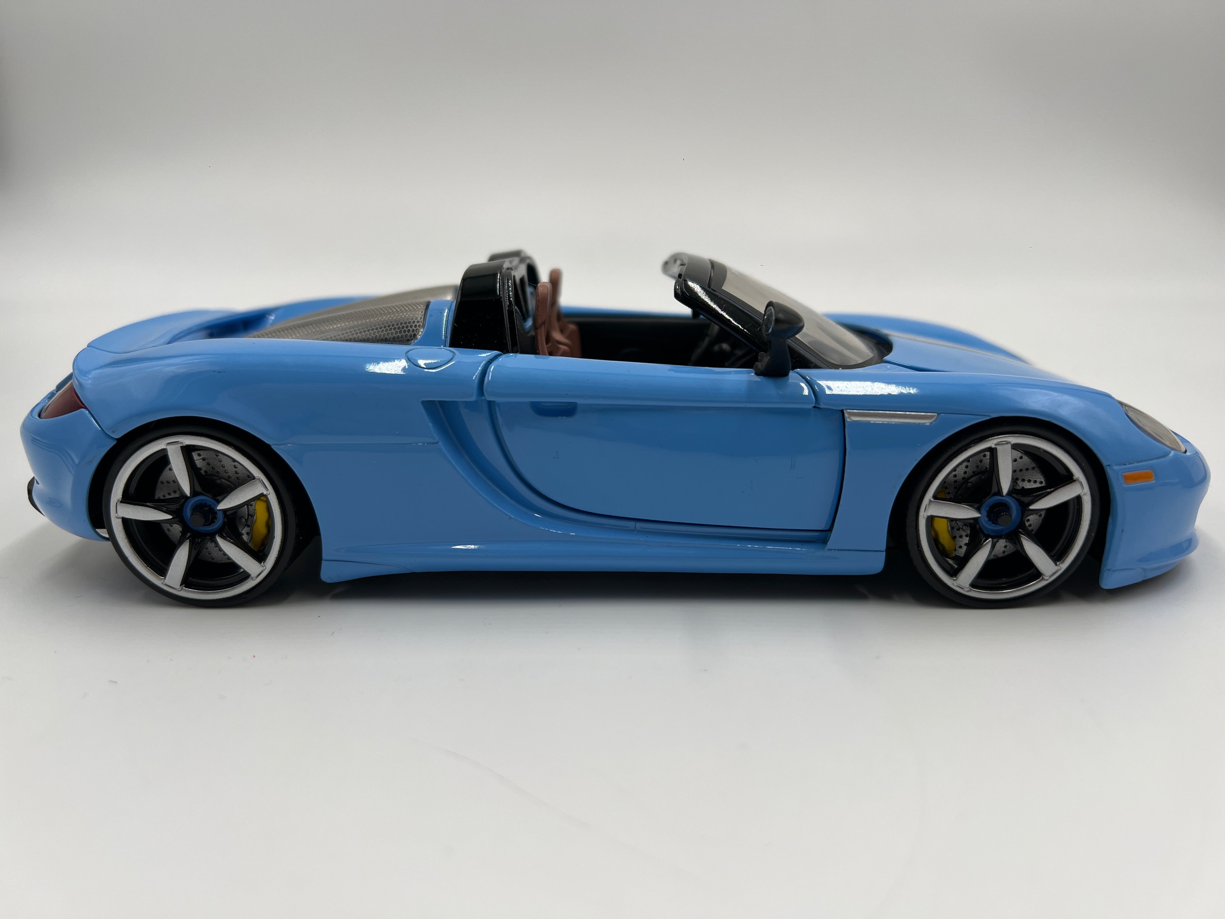 Jada Toys 1/24 Scale Pink Slips Porsche Carrera GT Light Blue