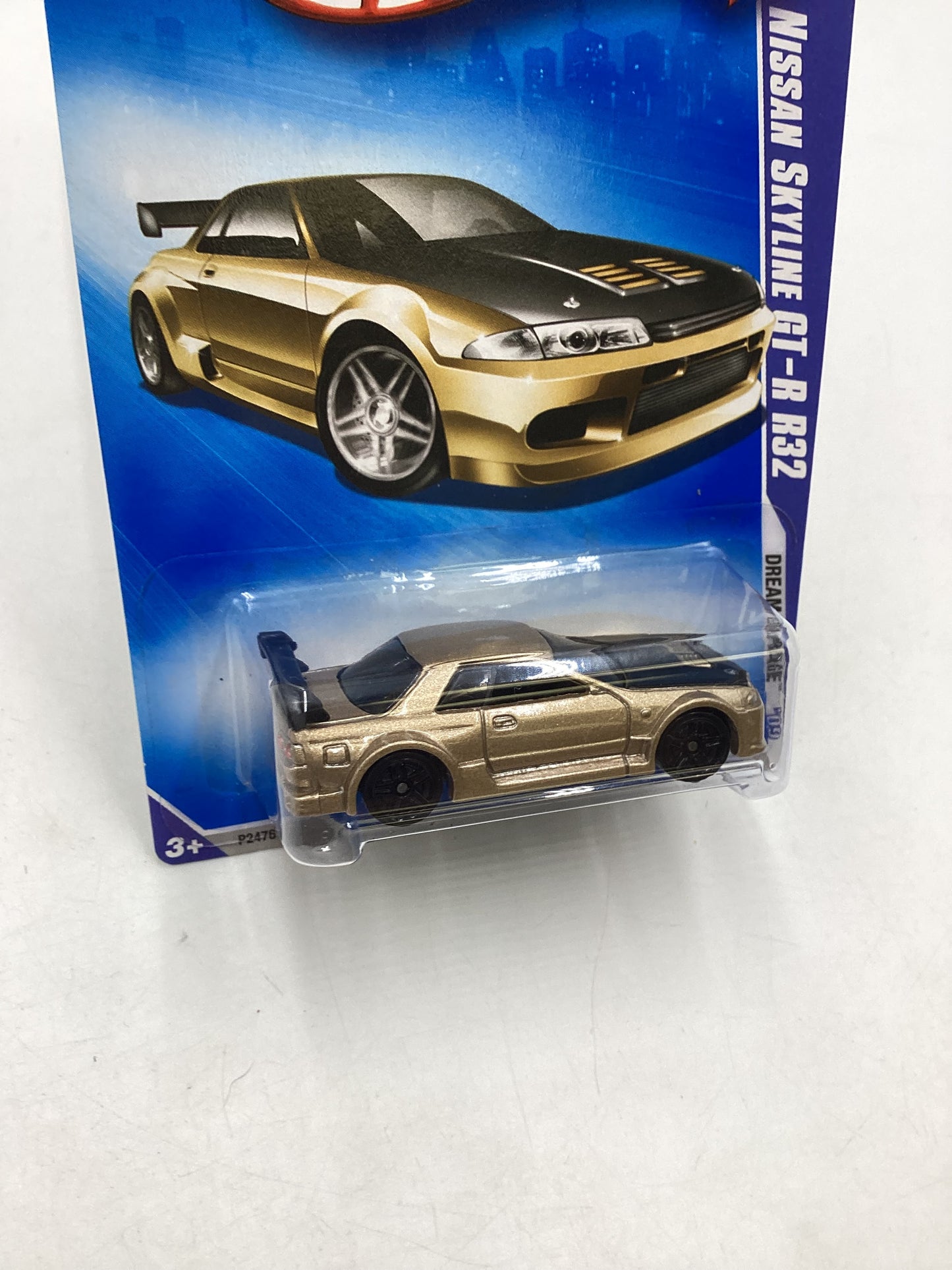 2009 Hot Wheels #156 Nissan Skyline GT-R R32 Gold  W/Protector