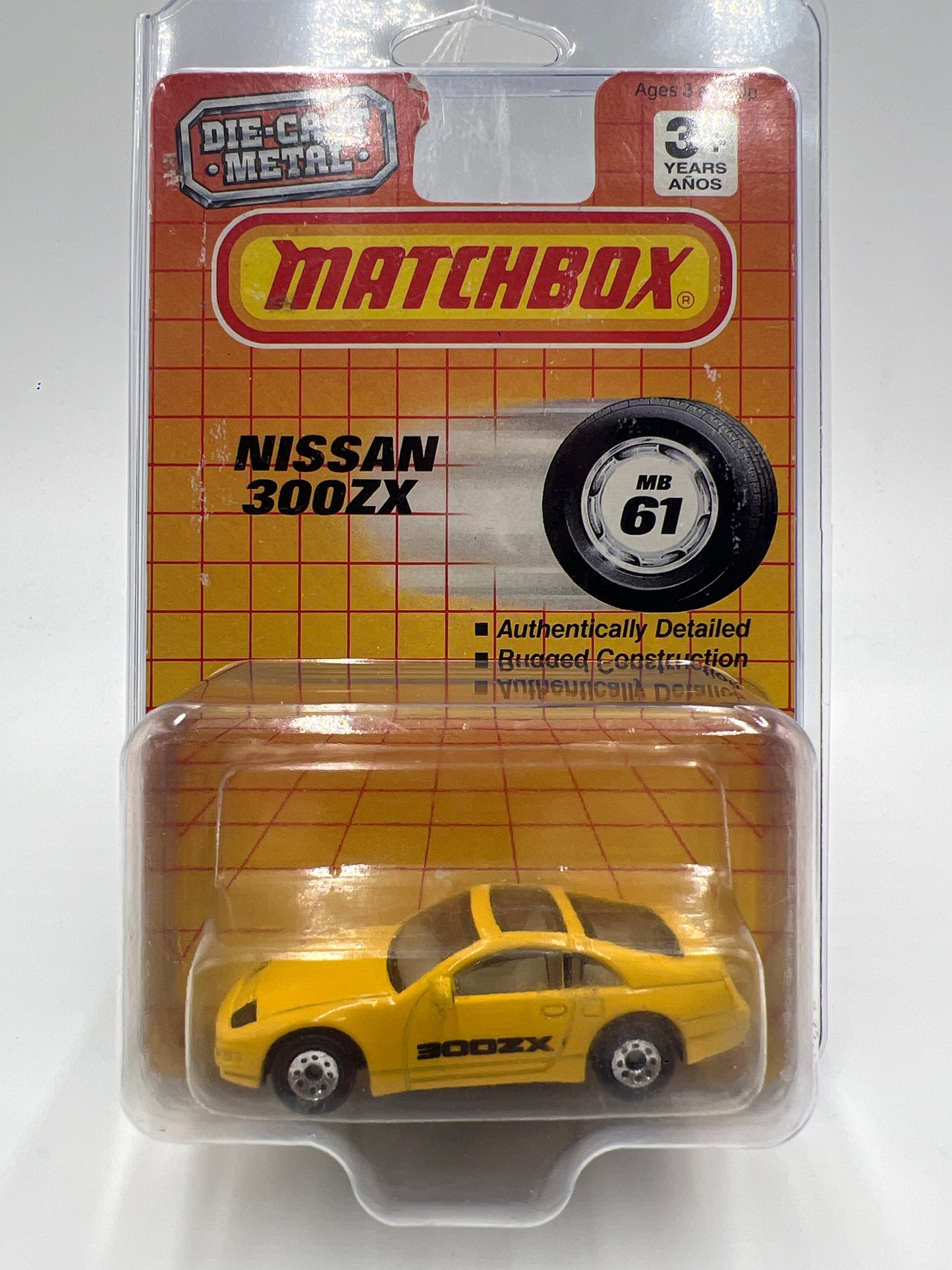 1990 Matchbox Motors MB #61 300ZX Yellow W/Protector Bad Card SR