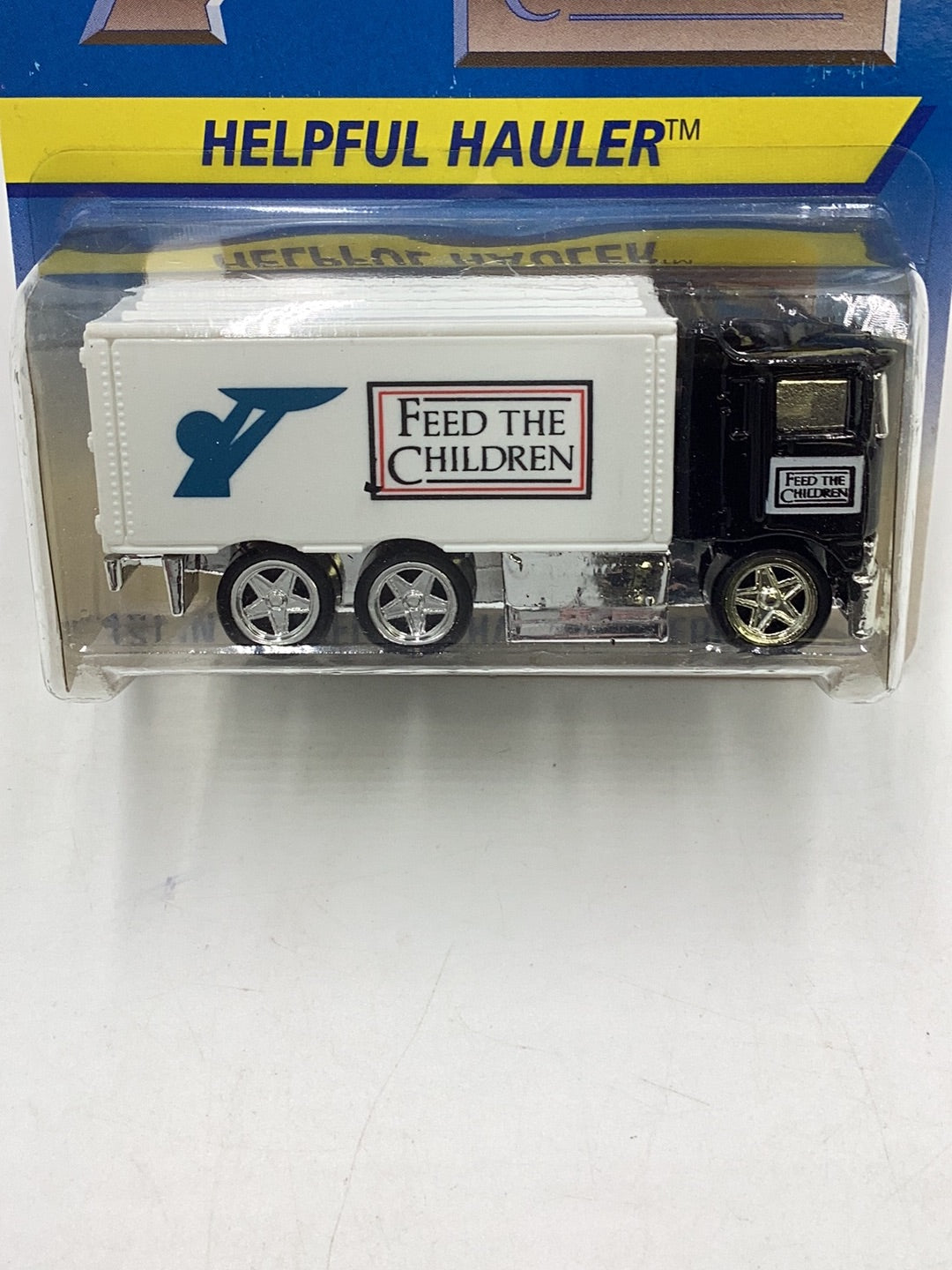 Hot Wheels 1995 Feed The Children Helpful Hauler 1/10000 with protector