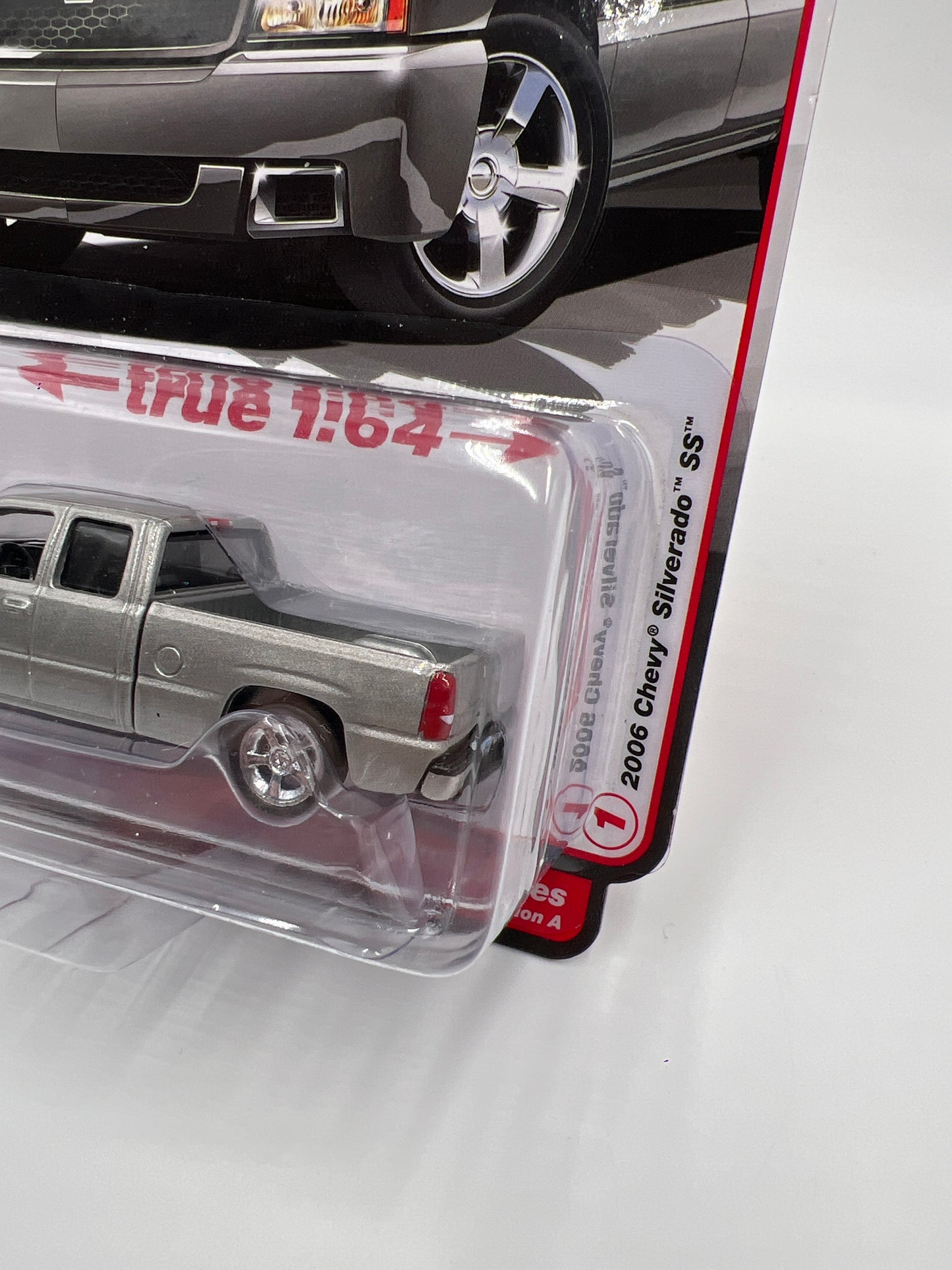 Auto World Muscle Trucks Release 4 Version A Cateye 2006 Chevy Silverado SS Silver 183C