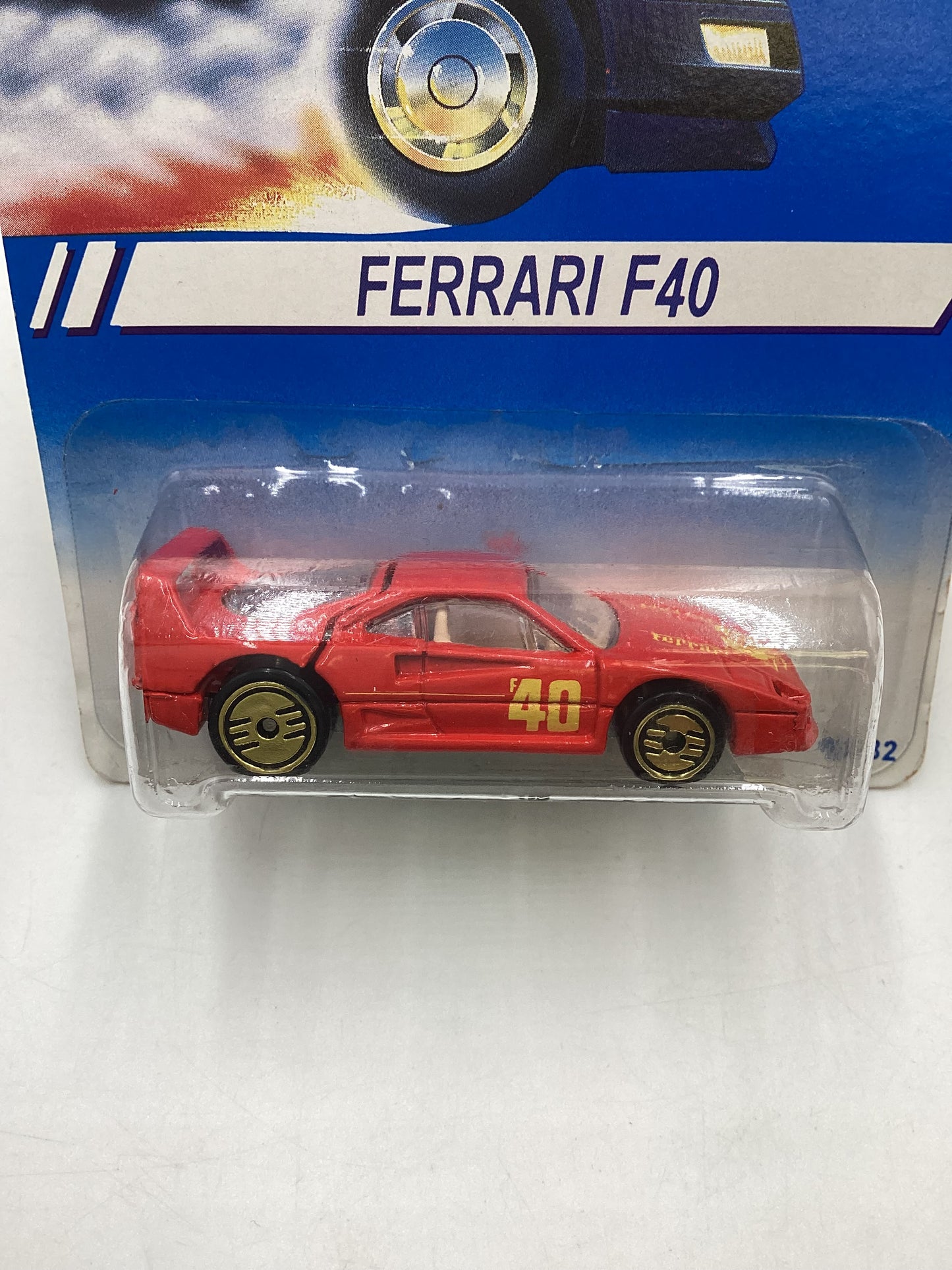 1994 Hot Wheels International Card 13582 Ferrari F40 Red Gold UH Wheels HTF with protector